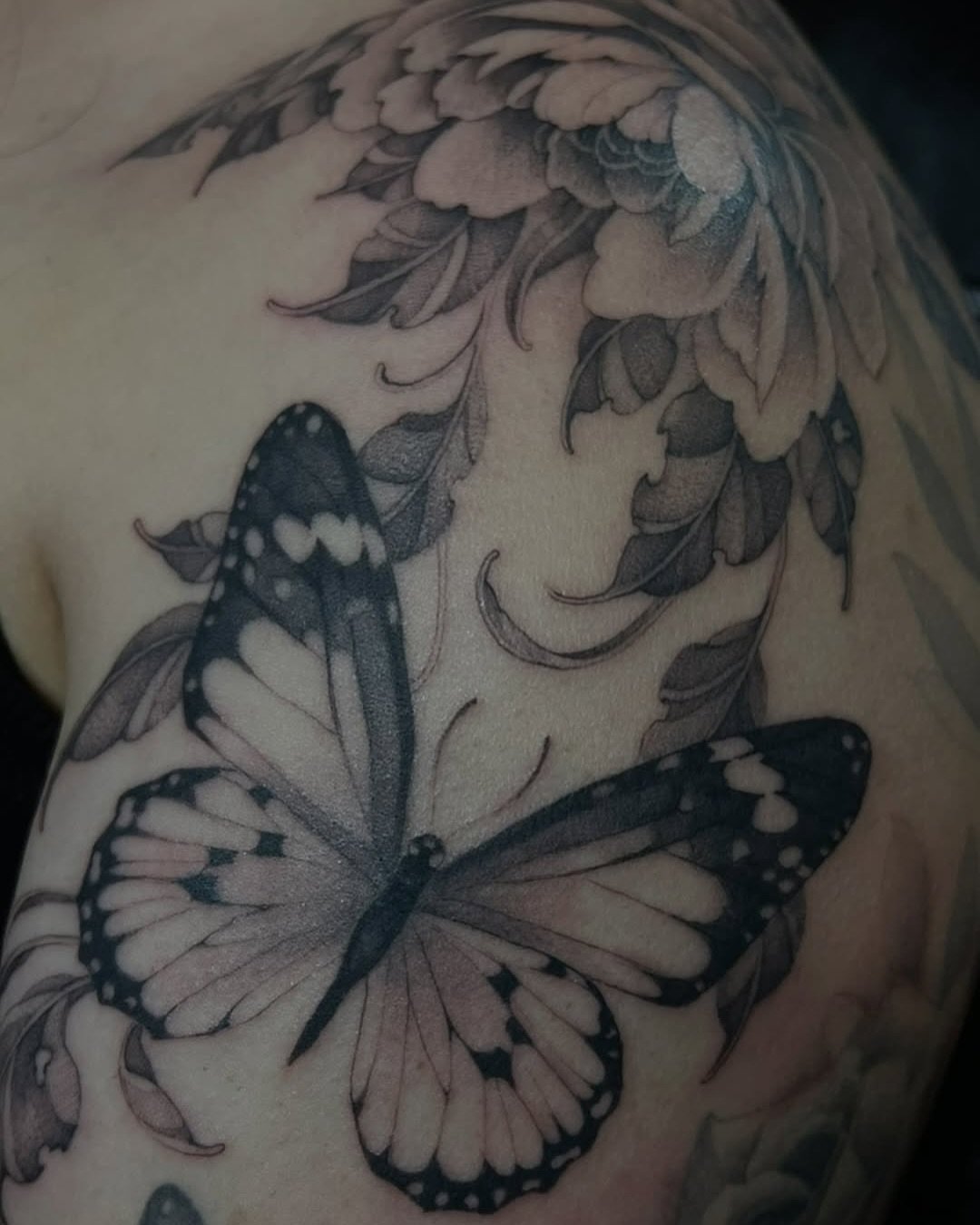 Butterfly and flower by resident artist @madaciide
&bull;
A couple weeks ago 🦋🩵🌼 

 rachelgrisham143 @folkloretattoocompany ☺️🥰