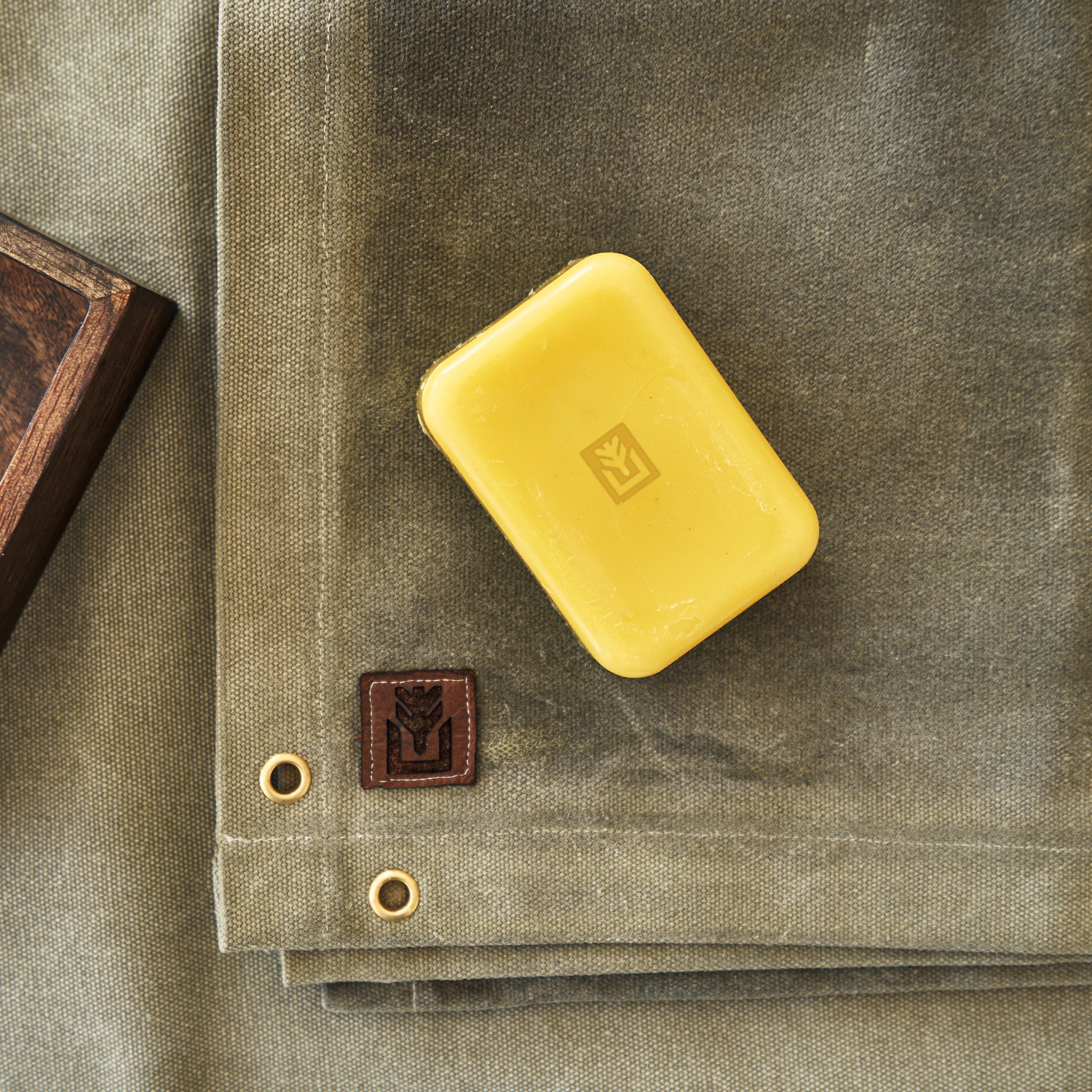 When a natural material can fit the need, we&rsquo;ll use it. 

Beeswax, canvas, leather &amp; wood - there&rsquo;s a reason these materials have stood the test of time. They can handle hard use, and they just look so damn good together.

We&rsquo;ve