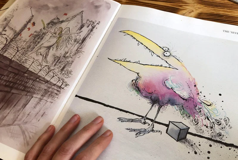 open book spread showing a Ronald Searle illustration of a colourful bird sitting over a square egg