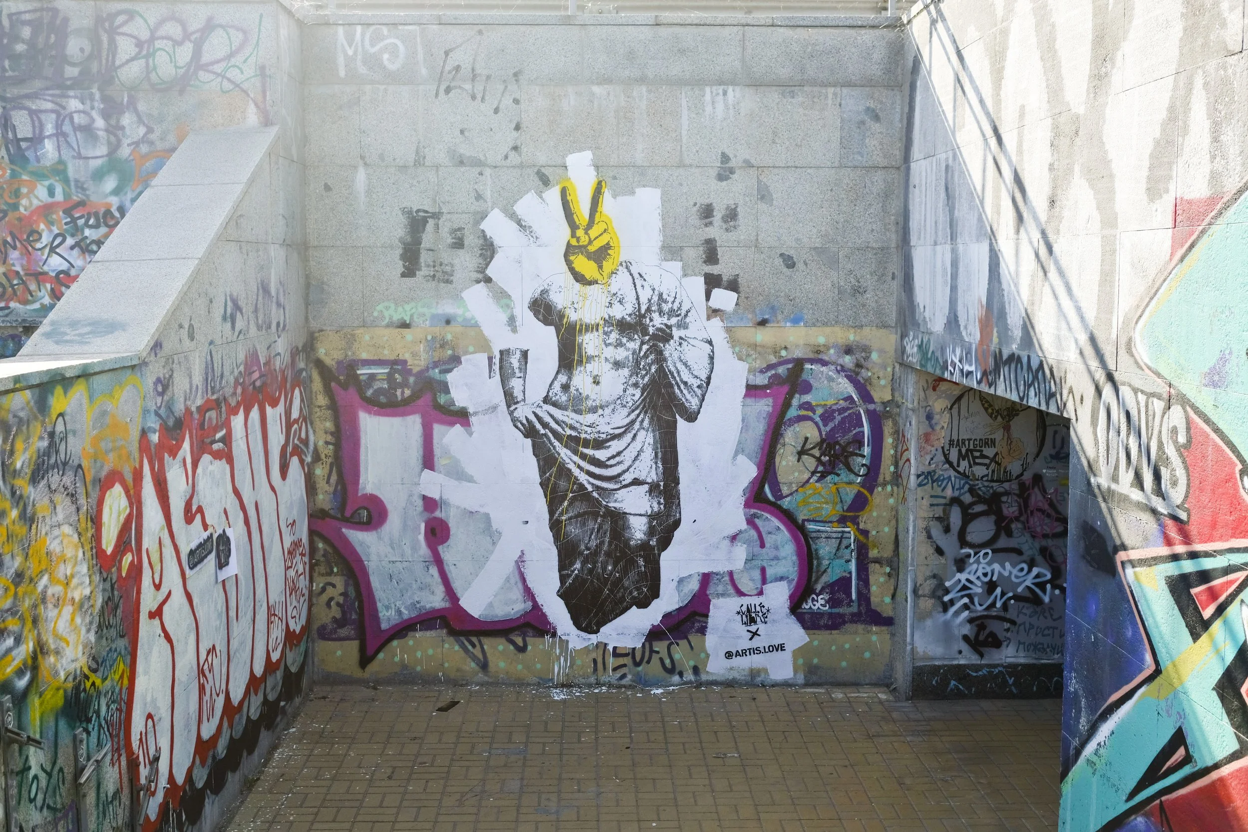 Austrian artist Artis.love with Calle Libre street art festival in Kiev Ukraine as a part of Austrian-Ukrainian cultural exchange