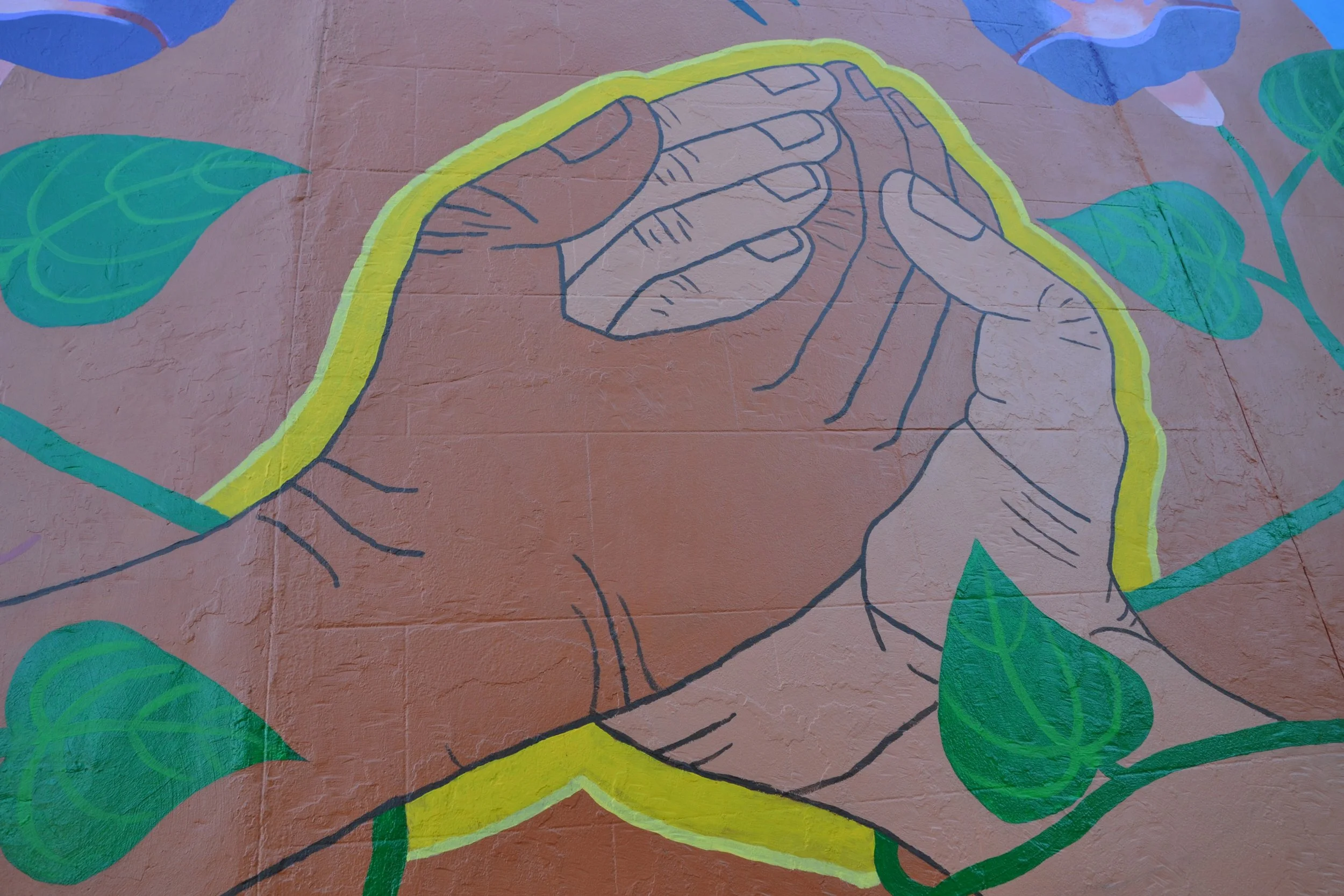 Edith Lopez-Estrada at the Calle Libre street art festival having its edition in Washington DC bringing together Austrian and American mural artists