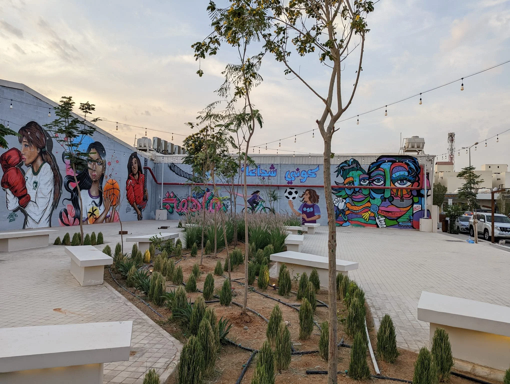 Chinagirl Tile and Calle Libre street art festival as a part of  "She (who) moves" mural project in Riyadh, Saudi Arabia, promoting women in sports and raising awareness around sports and wellbeing