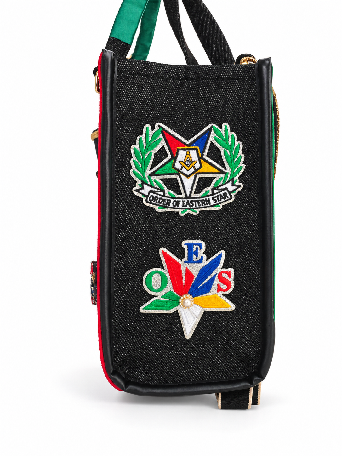 Detailed handbag on a white studio backdrop.png