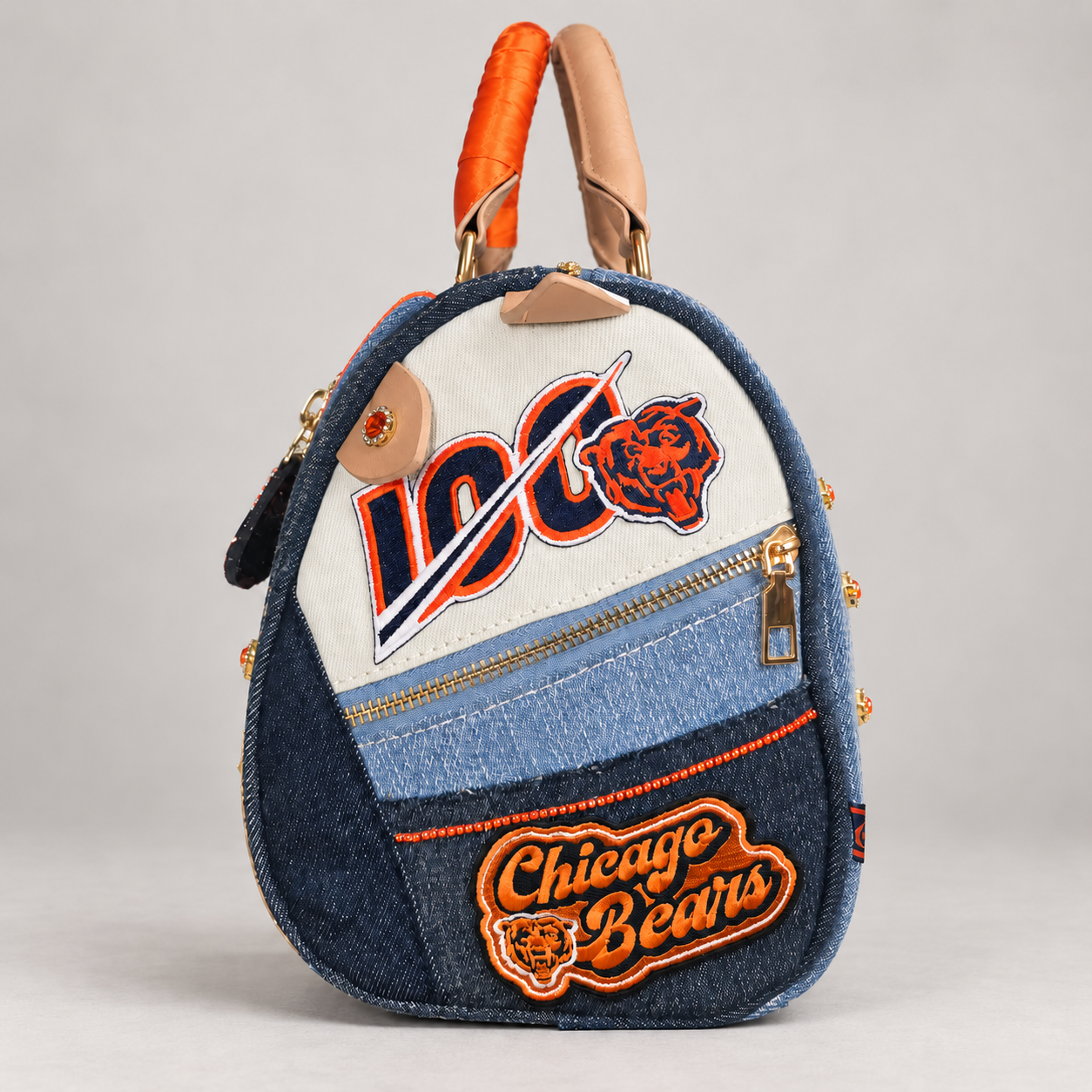 Orange ribbon and tan leather handles.png