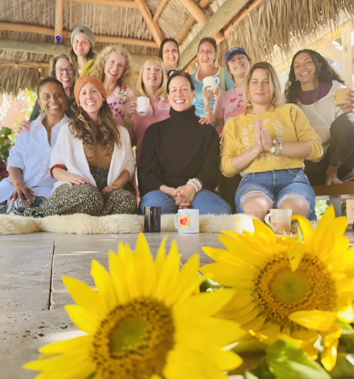 SweetGoddessGroupShotwFlowers.JPG