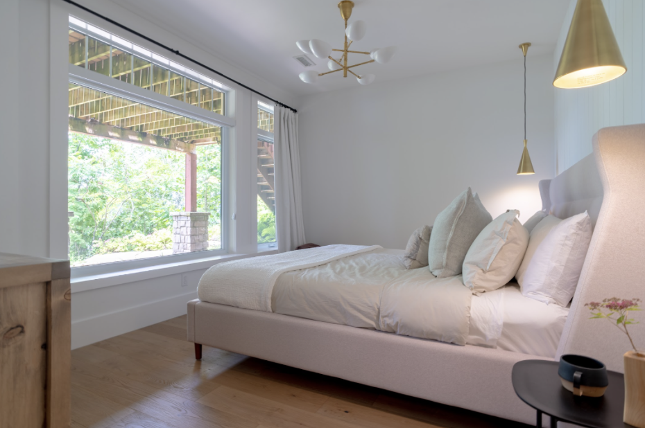 The ceiling mount light allows for yet another layer and with exterior natural light filtering in, this room becomes a bright and airy space.