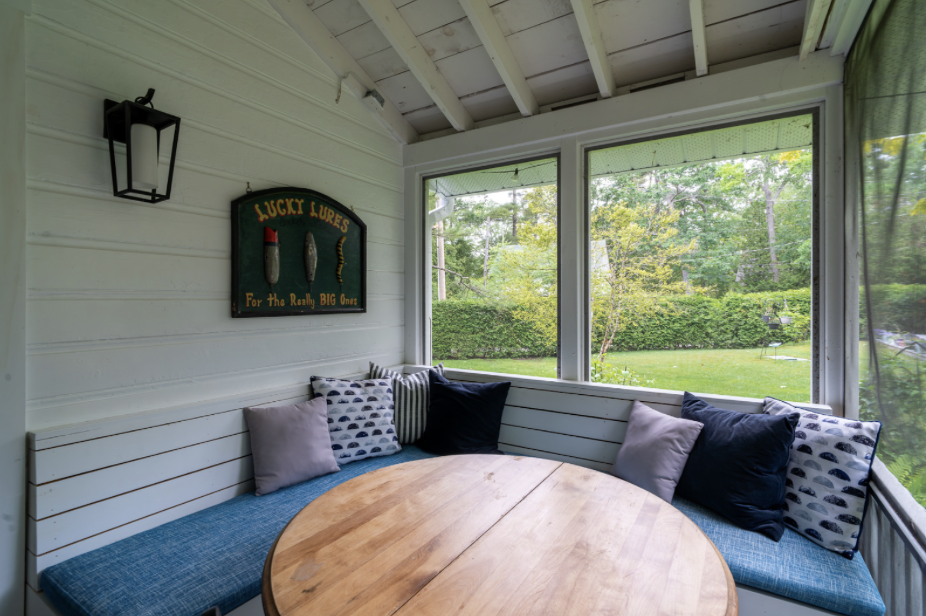 A small cottage style light works in this porch because it continues the cottage design story! As part of a screened in porch, it becomes an accessory to play up the cottage feel and to keep in touch with the historical feeling of Project Corn Cob.