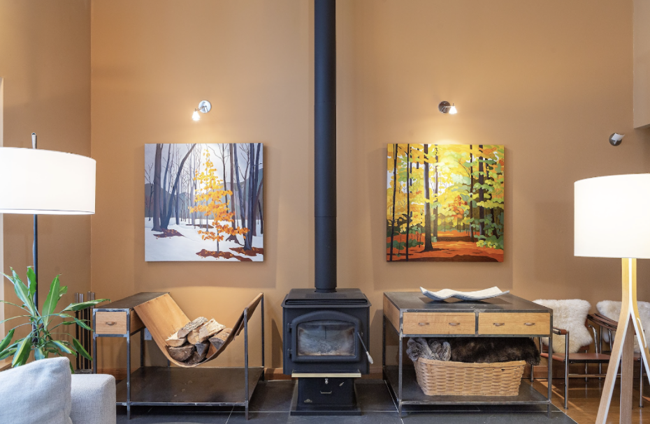   Our Forest Road project features a warm terra cotta paint coupled with seasonal art and flanking this wood stove, who wouldn’t want to curl up here!  
