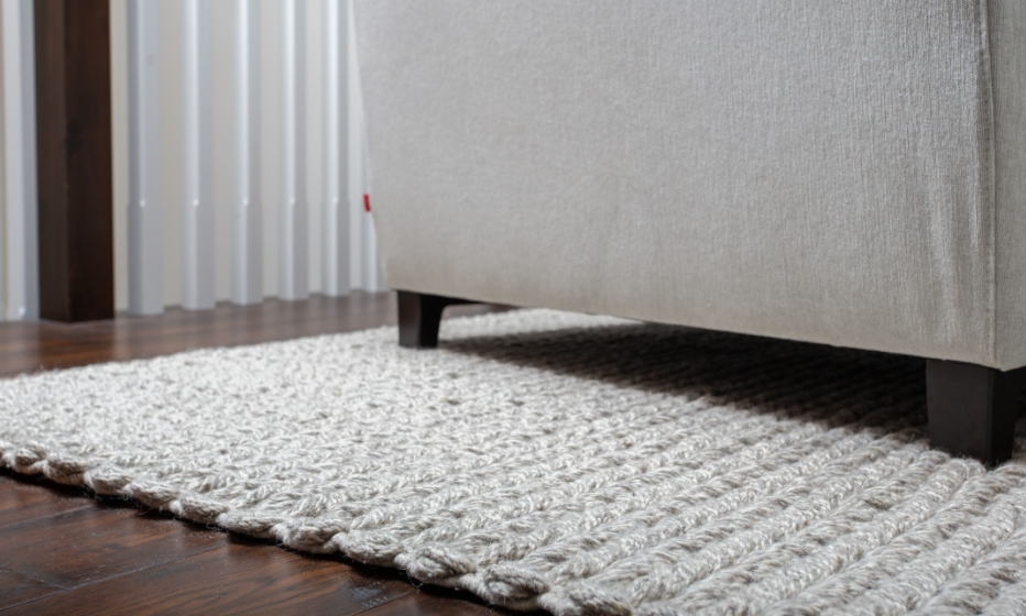   Switching up rugs to darker colours can also provide a warmer, cozier feel for entries and hallways.  