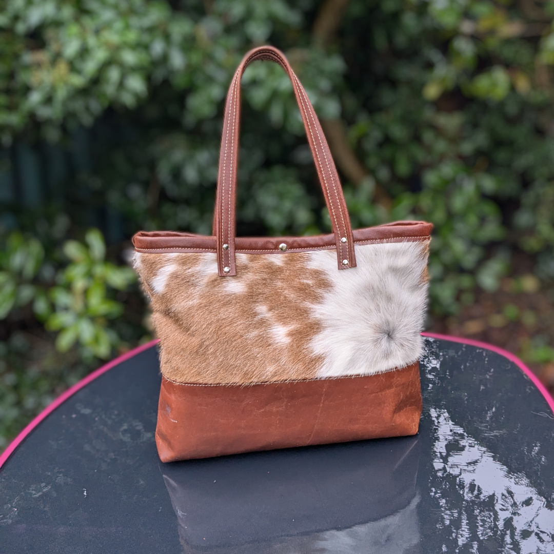 Hair on hide tote bag