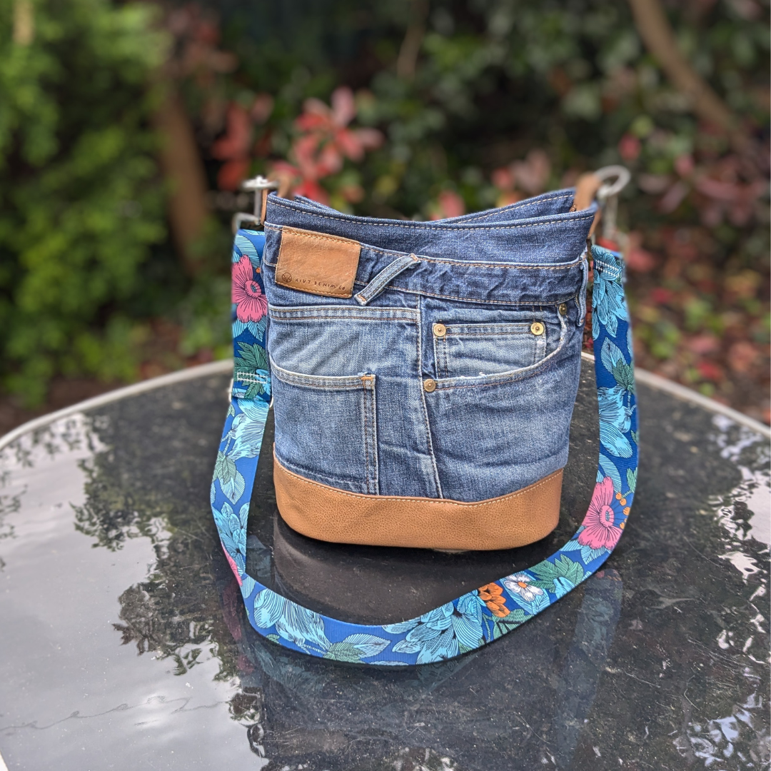 denim bonnie with floral strap.png