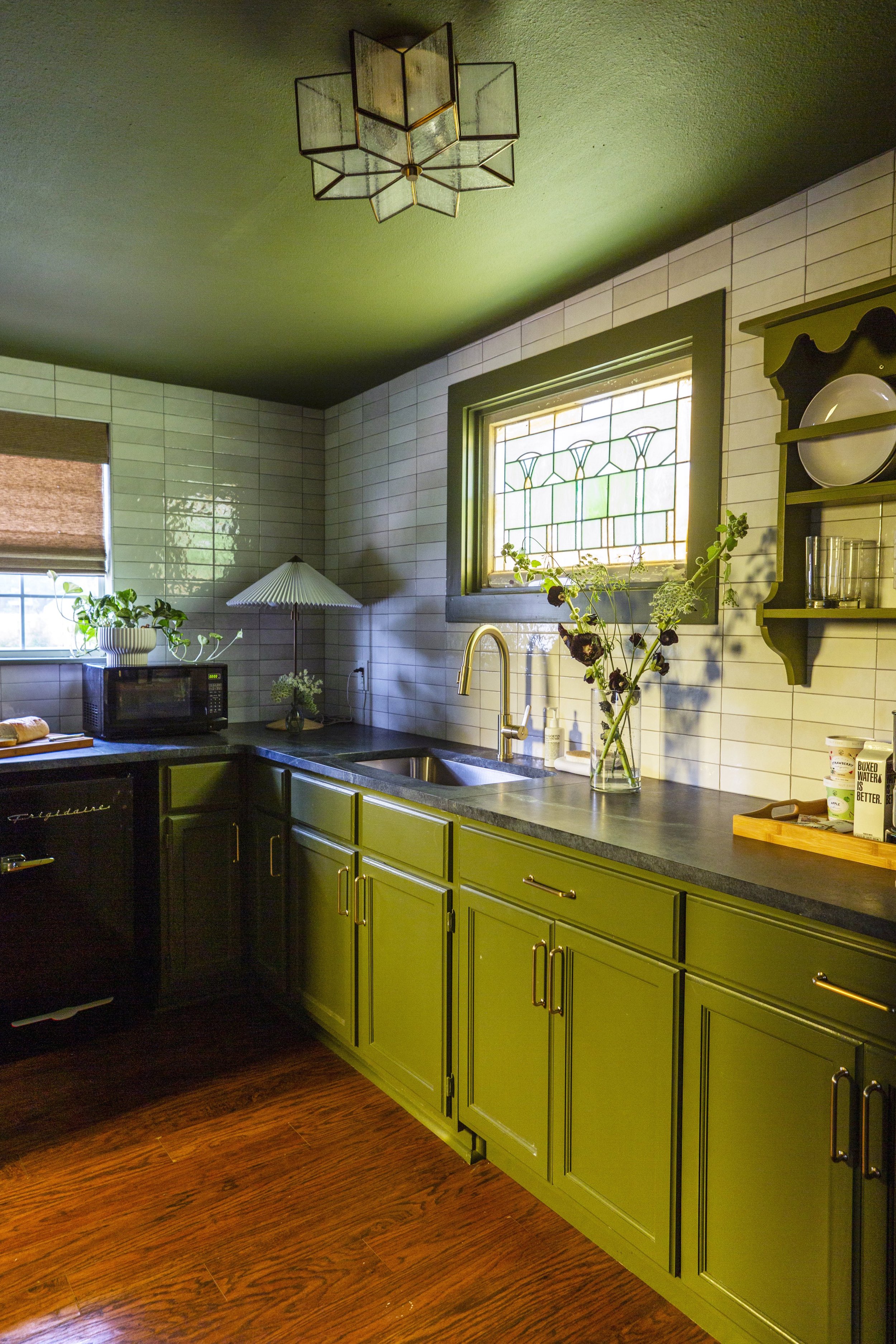 Charming green kitchen in private bungalow in Fredericksburg, Texas
