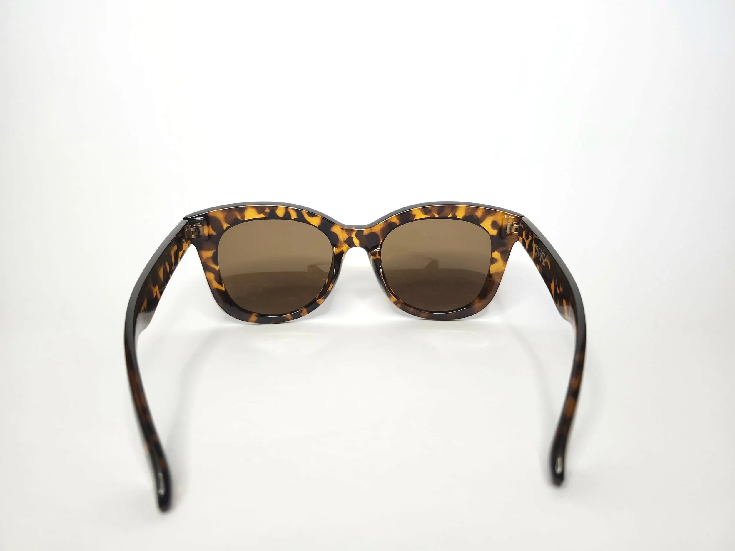 Holly Golightly, Tortoise Shell, oversized sunglasses, cat eye, breakfast at tiffany's, little black dress, socialite, cult specs