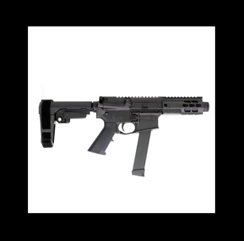 Black tactical pistol-styled firearm with a stock, magazine, and scope mounted on top, displayed against a white background.