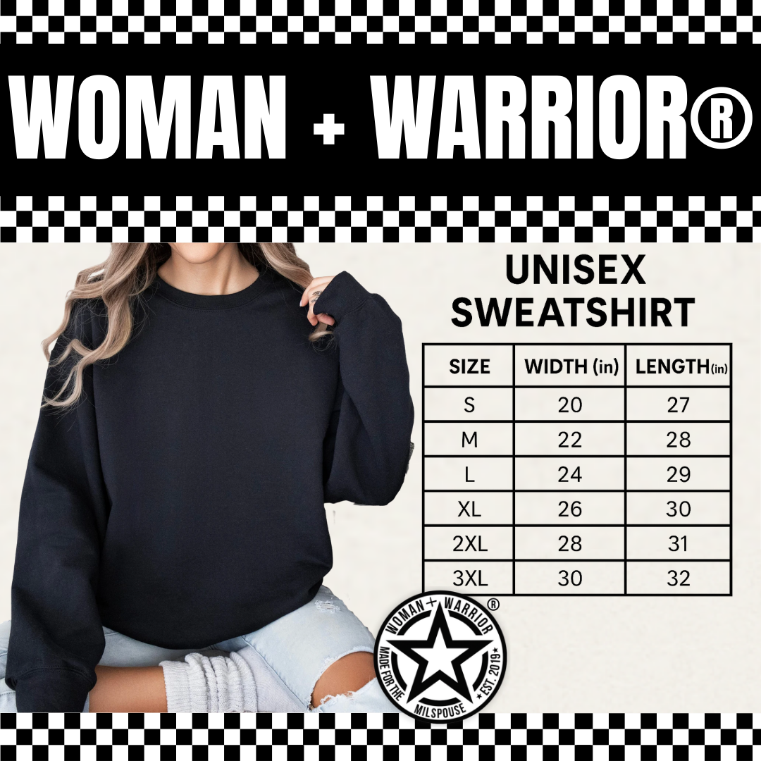 A woman wearing a black unisex sweatshirt with a size chart. The chart lists sizes from small to 3XL with corresponding width and length measurements in inches.