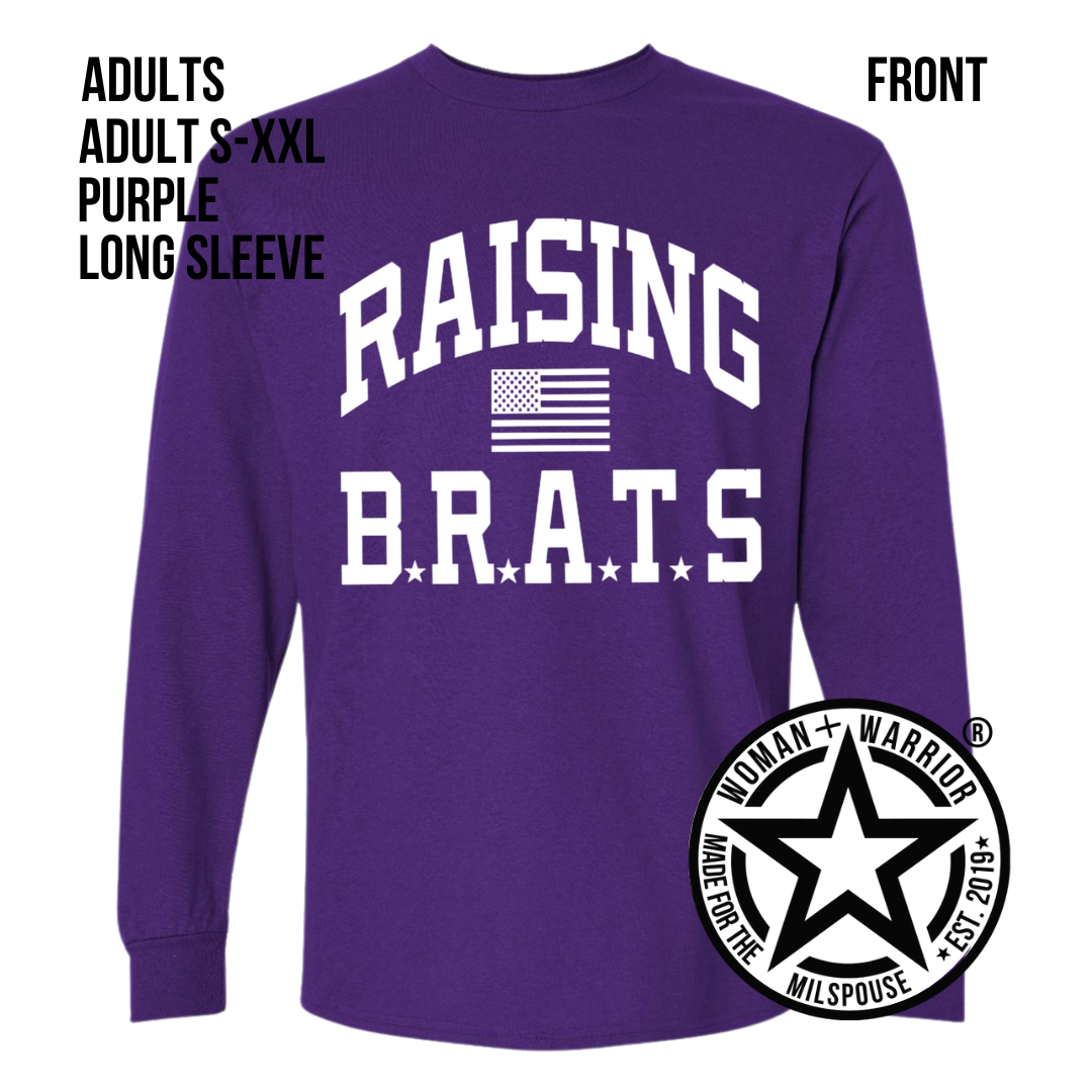 Purple long sleeved shirt with bold white text that reads "RAISING B.R.A.T.S" along with an American flag design in the center.