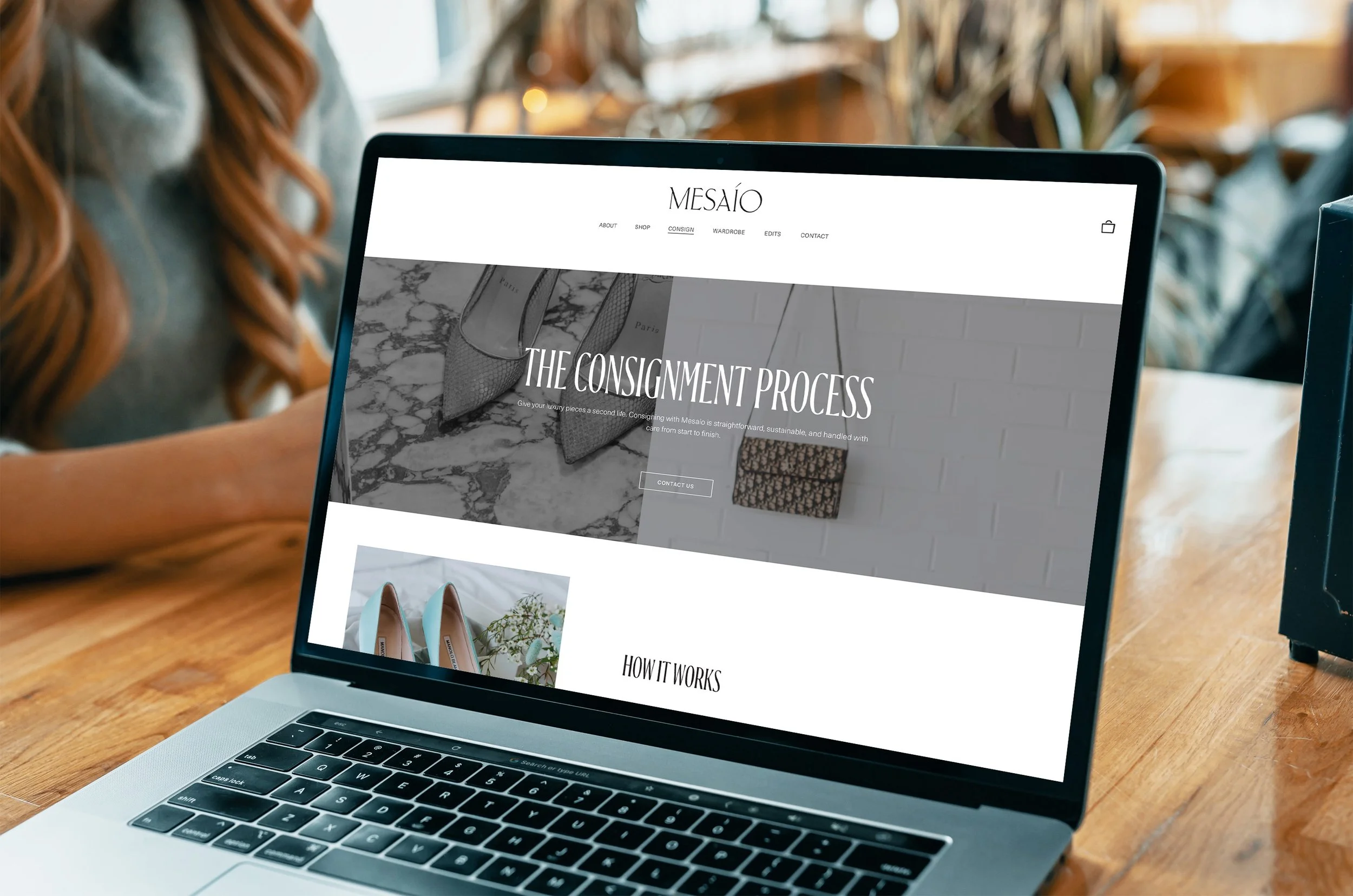 laptop displaying Mesaio website