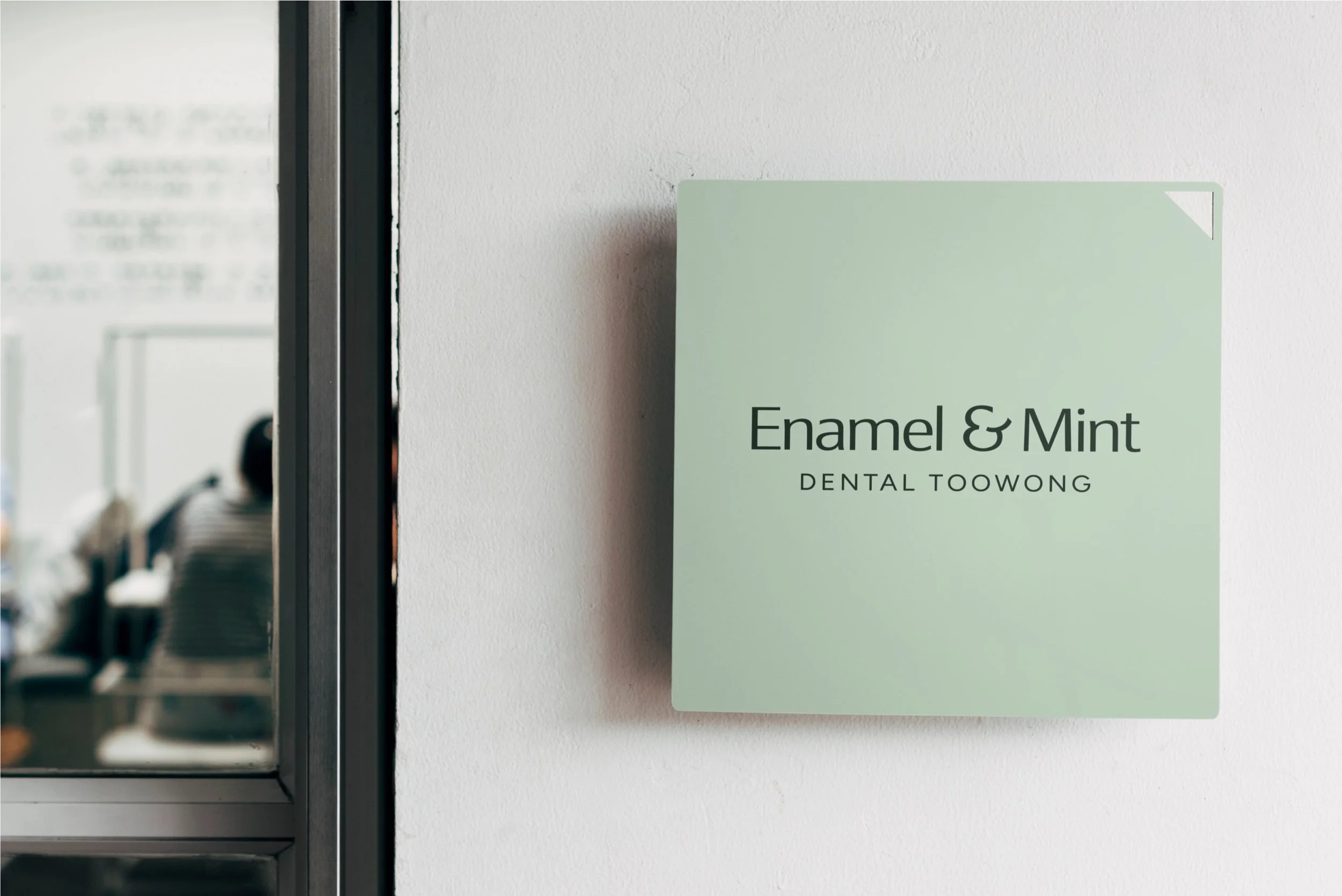 door sign saying Enamel & Mint