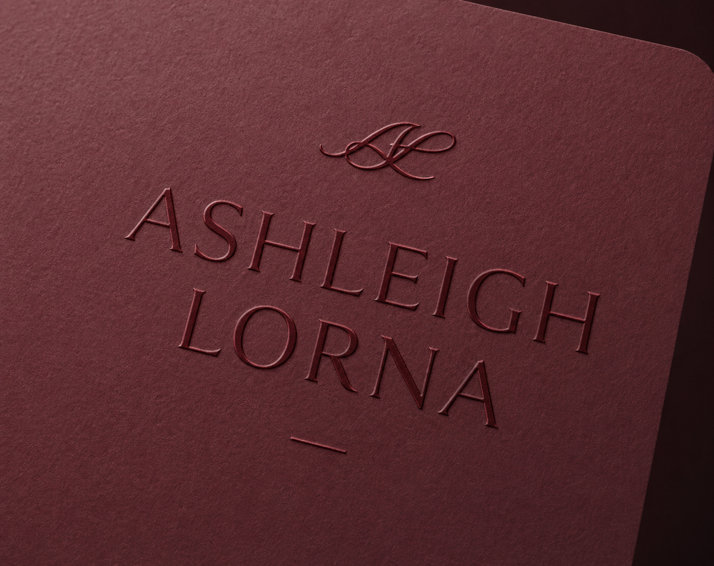 logo on a burgundy background