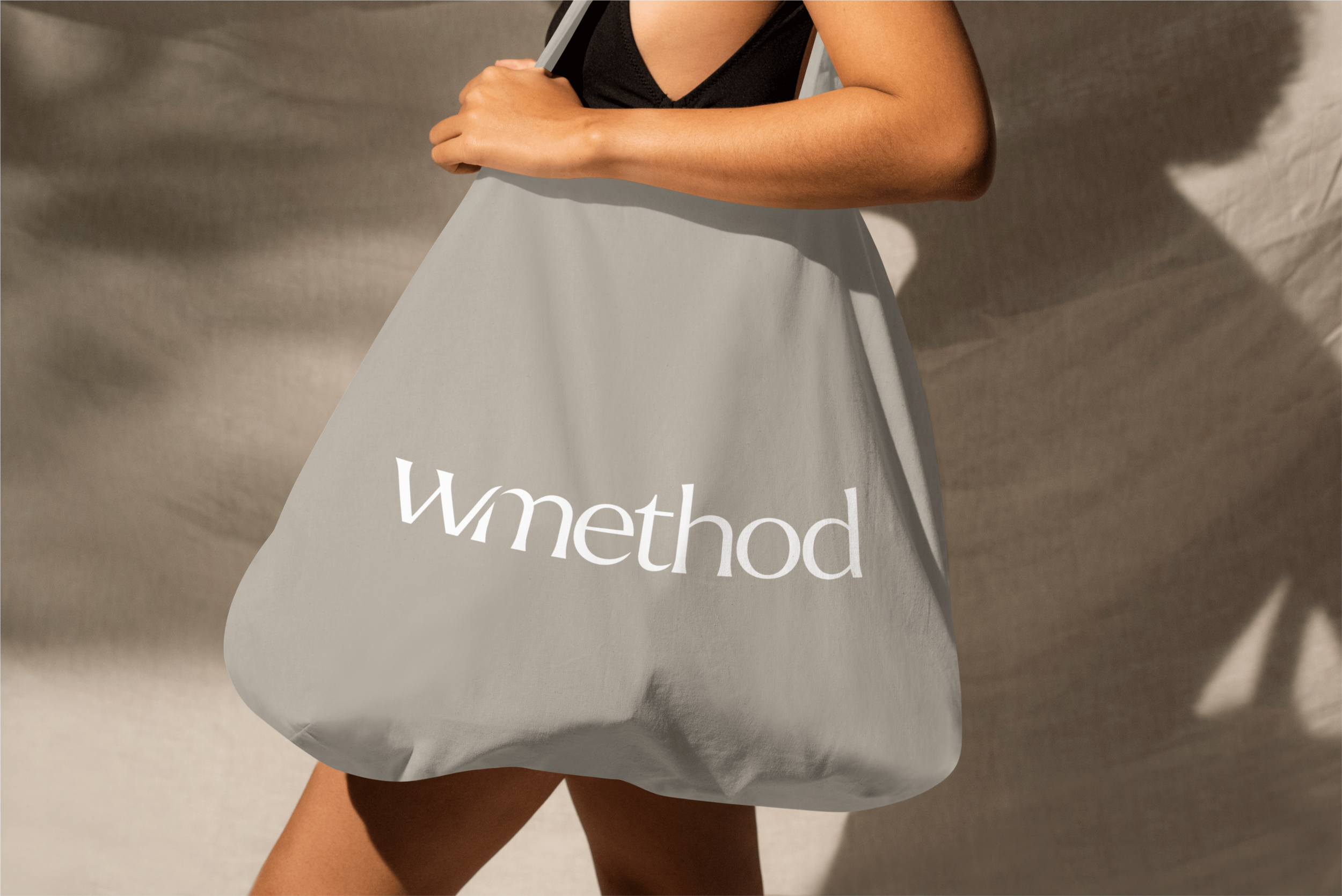 logo for Pilates studio displayed on a bag