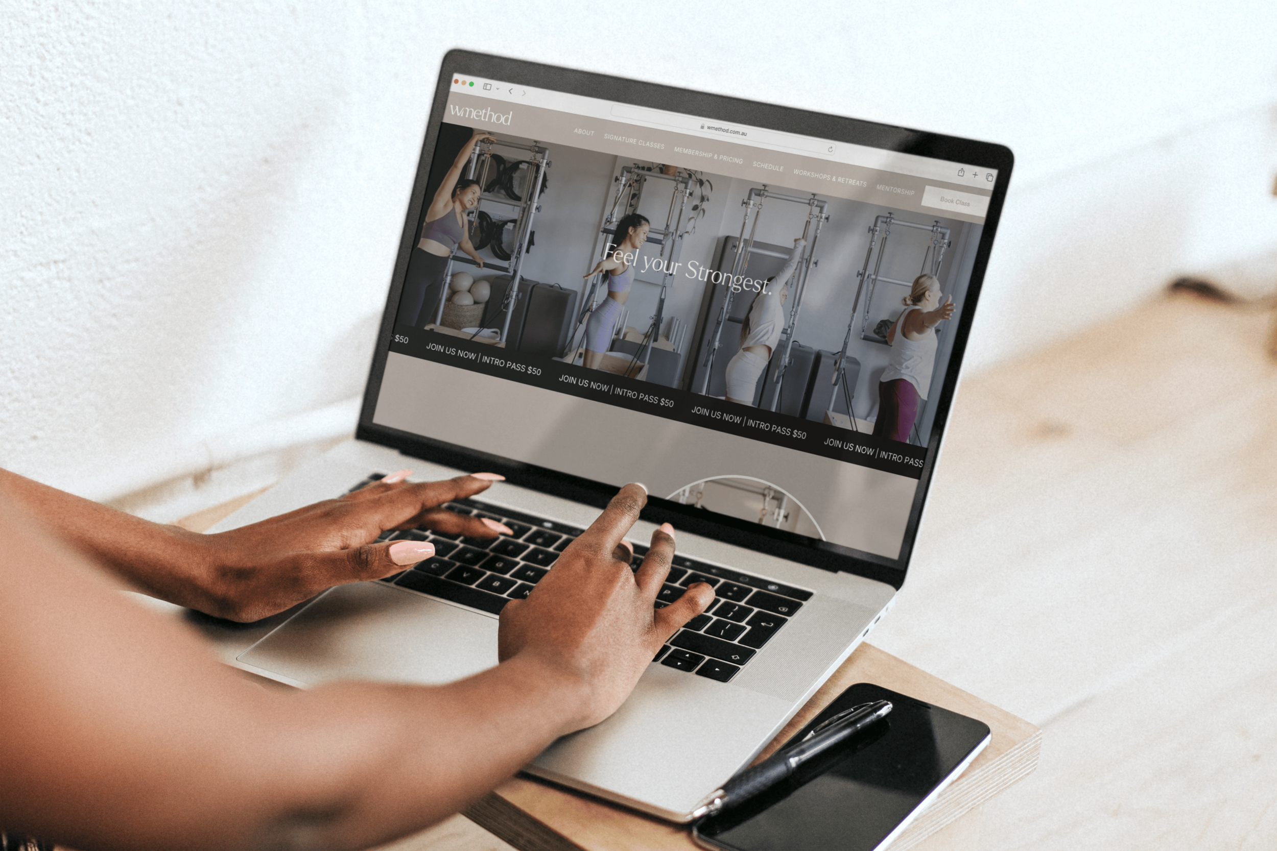 woman working on laptop with wmethod website design