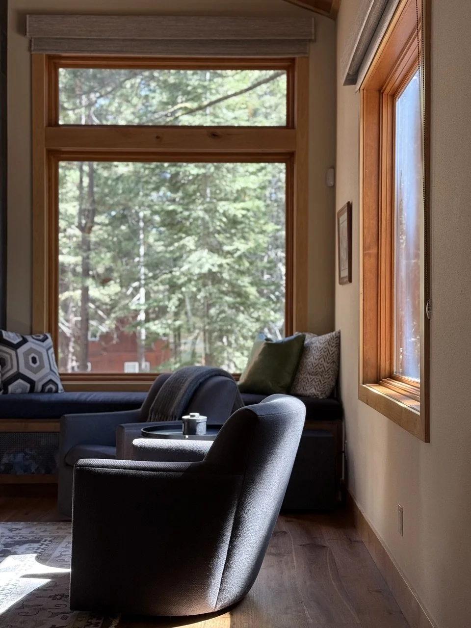 Warm contemporary living room in a luxury Tahoe Donner mountain home designed by Eden Wright Design.