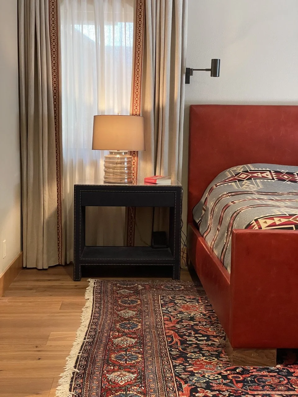 Guest bedroom in a luxury Truckee mountain retreat designed by Eden Wright Design.