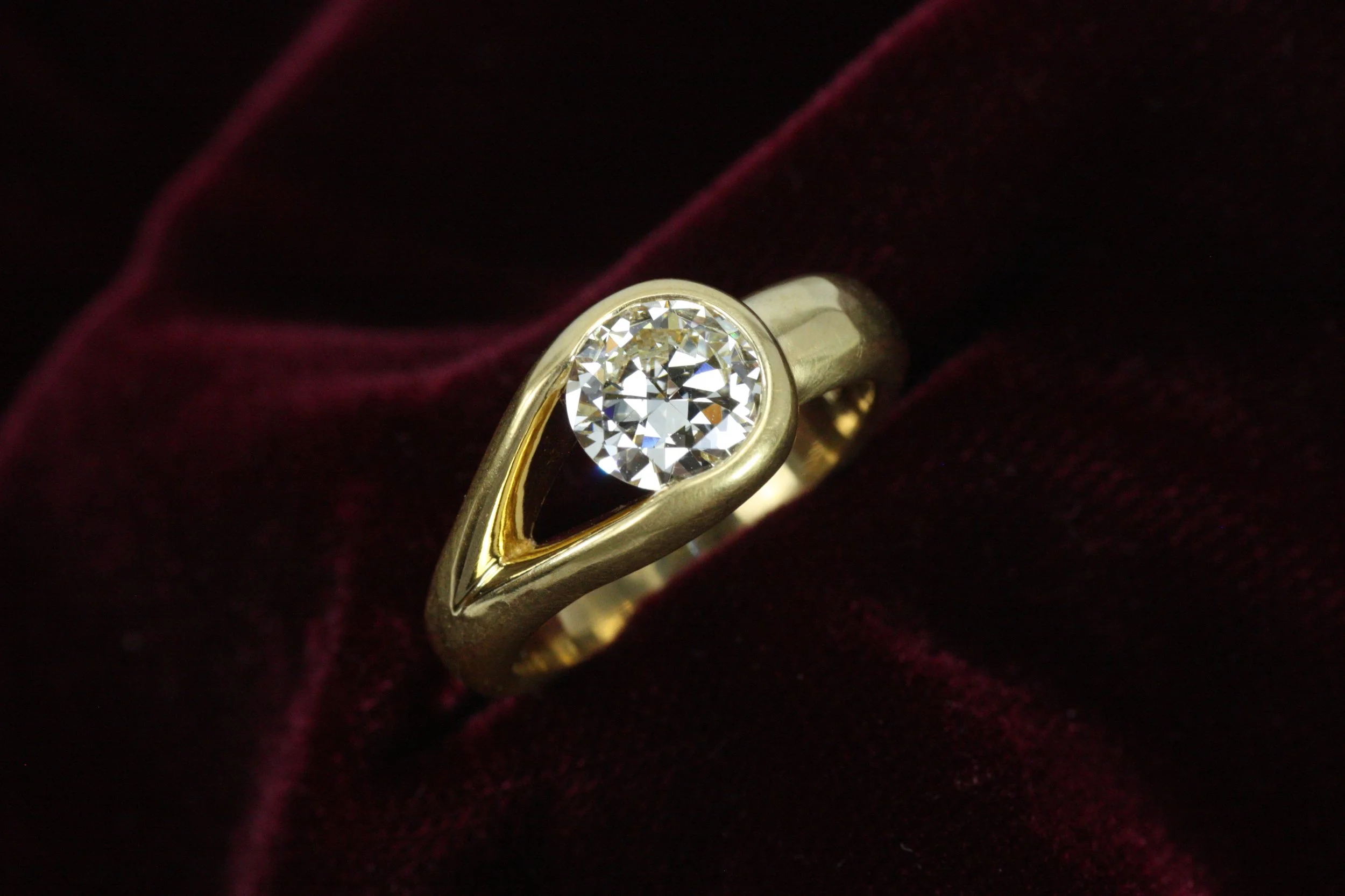 Asymmetrical chunky engagement ring by Bracken Jewelers