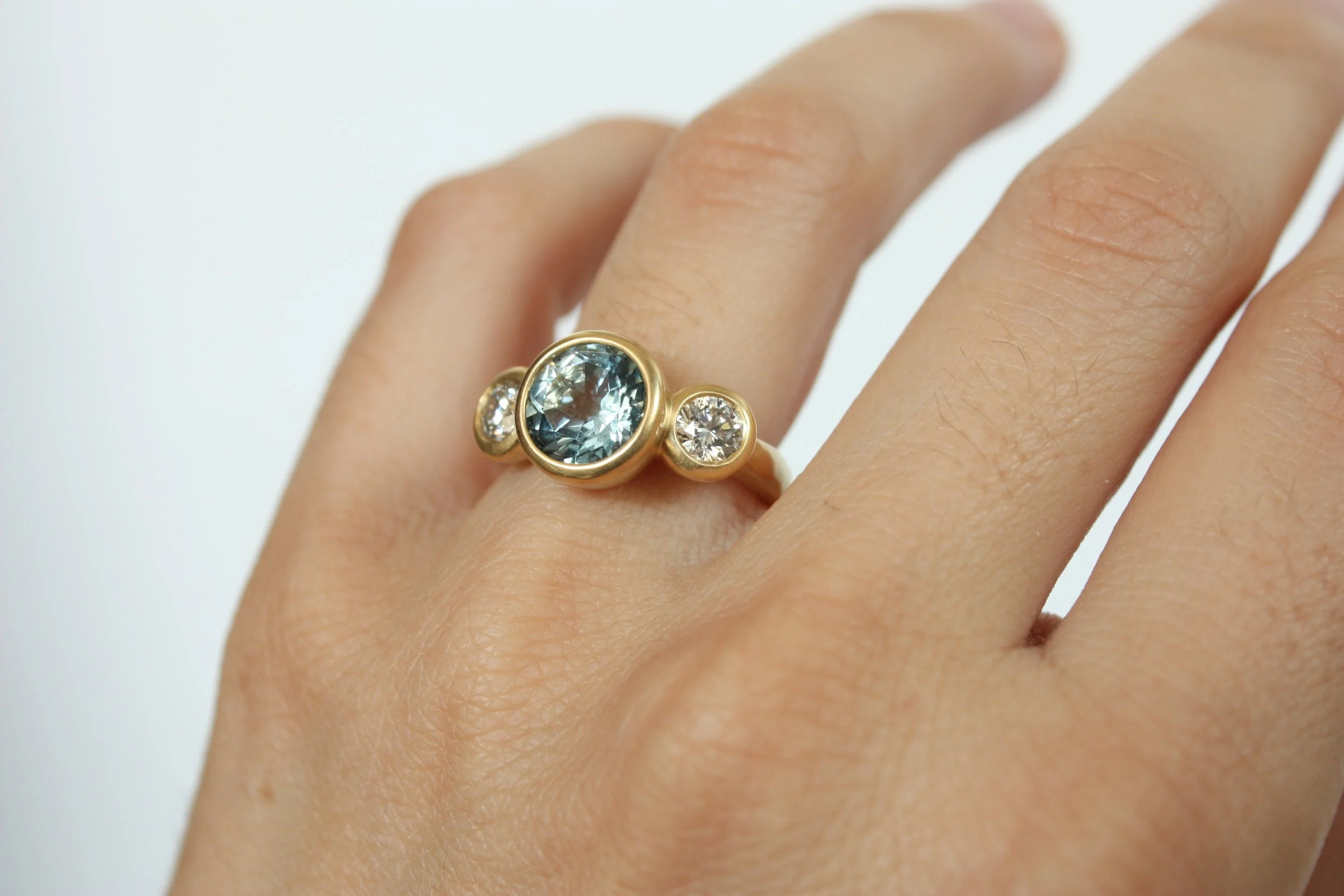 Bold three-stone chunky engagement ring by Bracken Jewelers