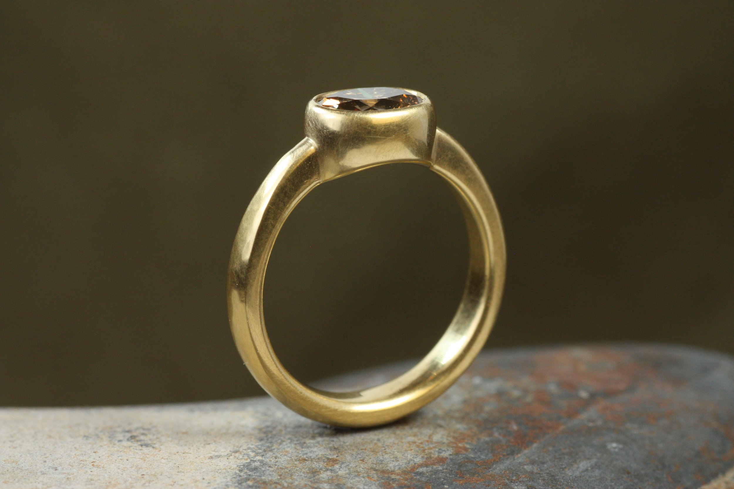 oval brown diamond bezel engagement ring