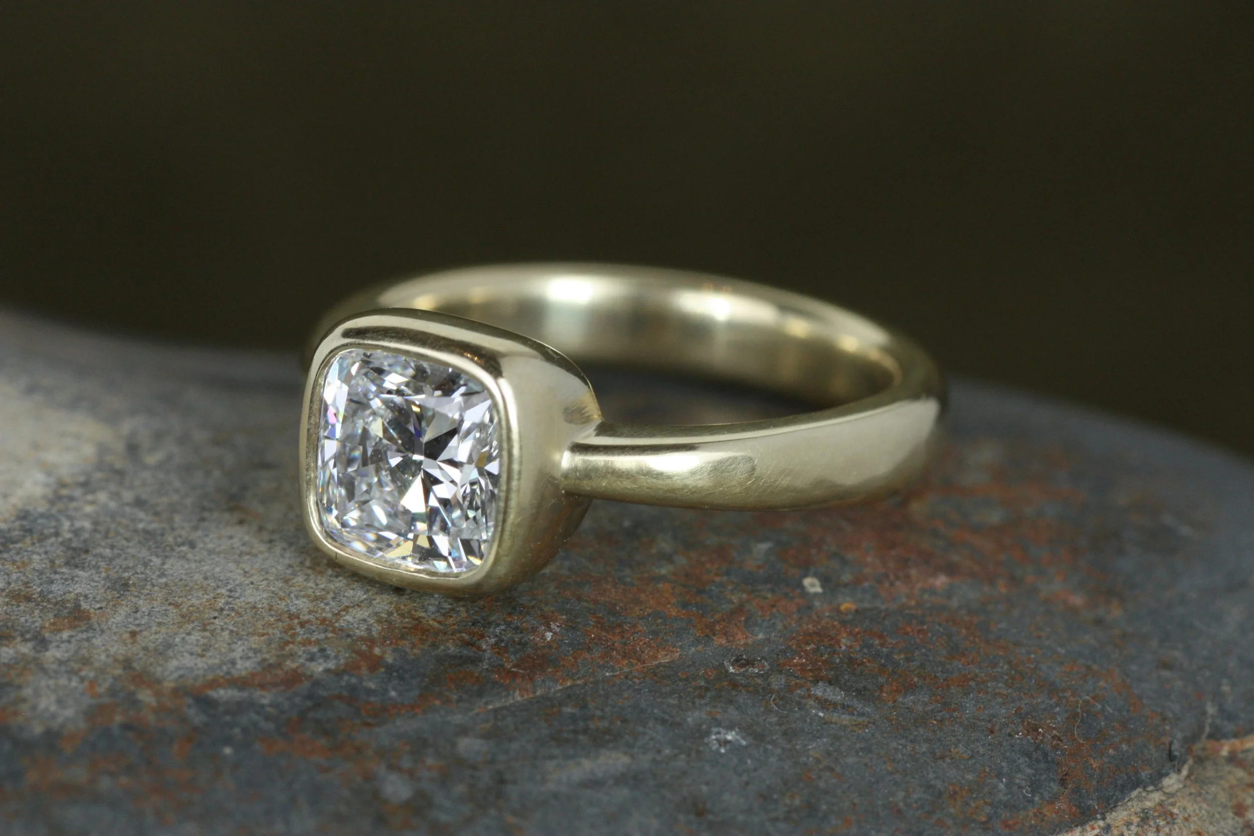 cushion cut lab diamond bezel engagement ring