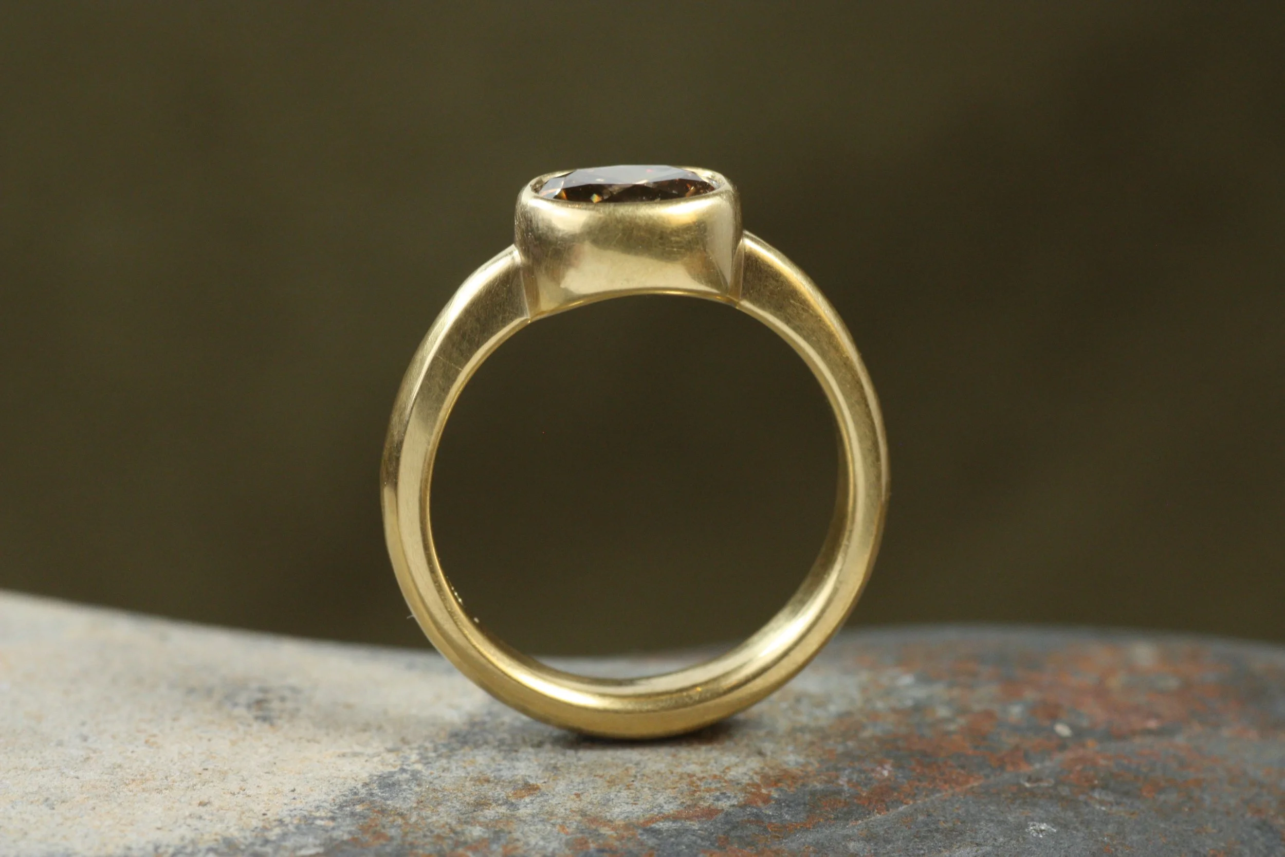 oval brown diamond bezel engagement ring