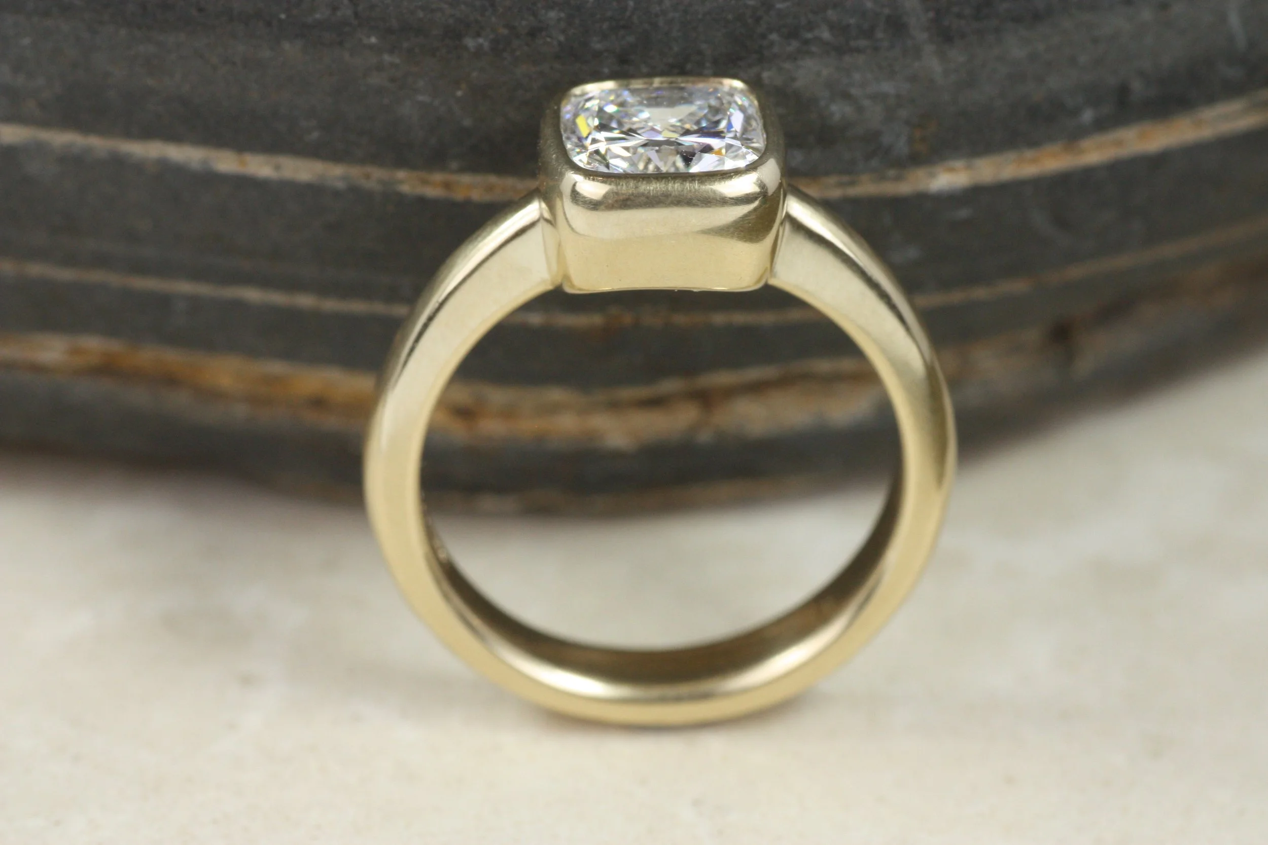 cushion cut lab diamond bezel engagement ring