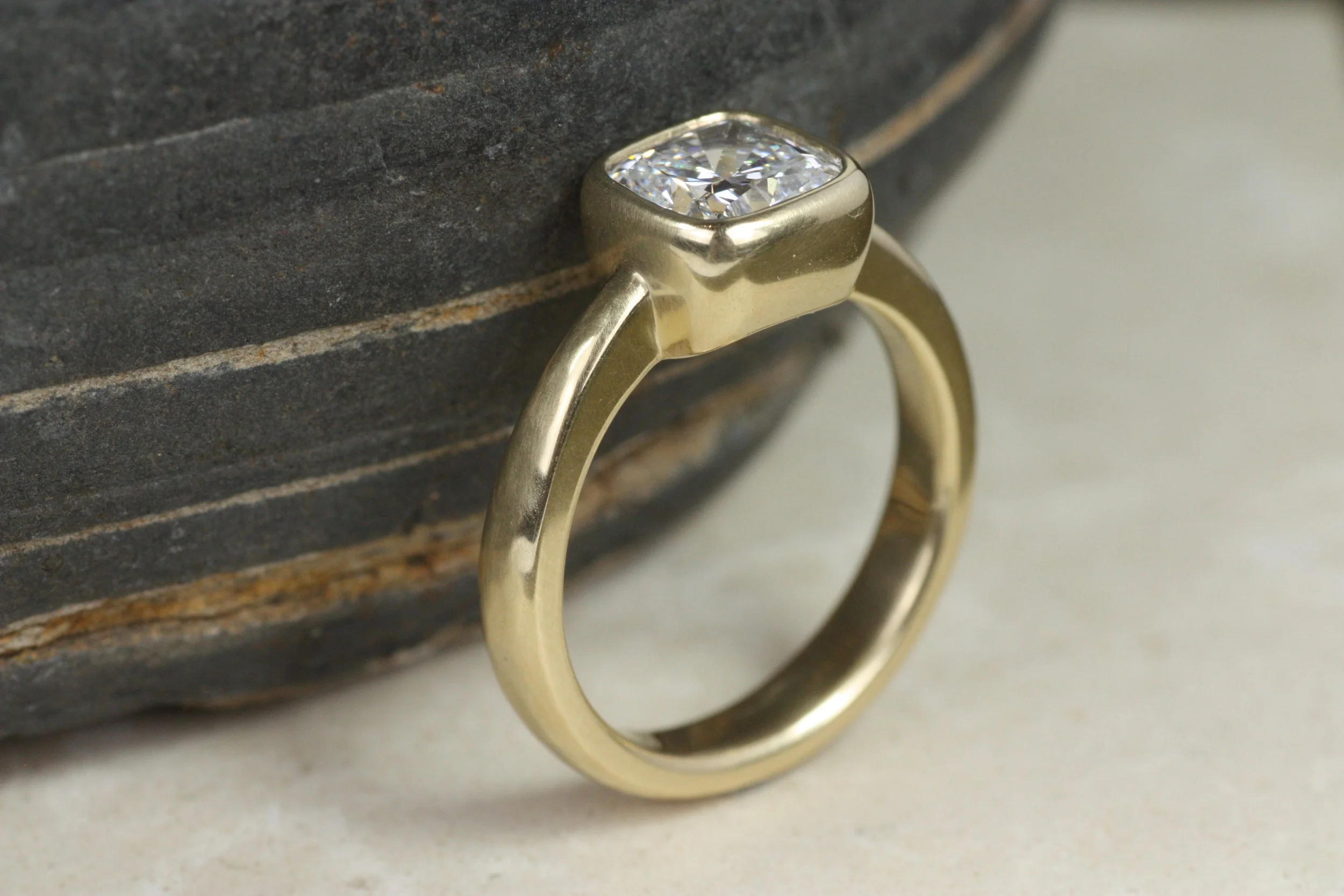 cushion cut lab diamond bezel engagement ring
