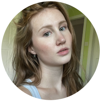 Photo of Annika- white women with long red hair