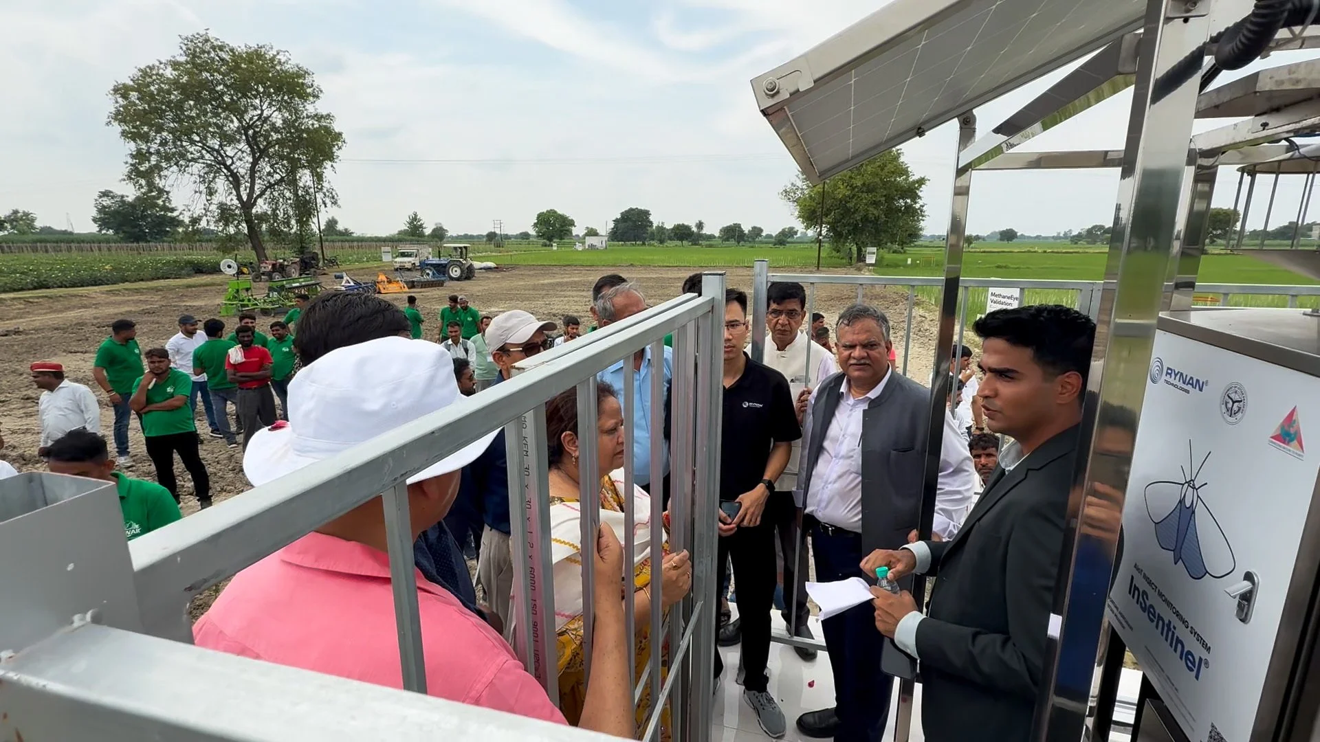 RYNAN engineers demonstrate the InSentinel AI insect monitoring system to government officials and partners during the Uttar Pradesh sustainable farming pilot inauguration.