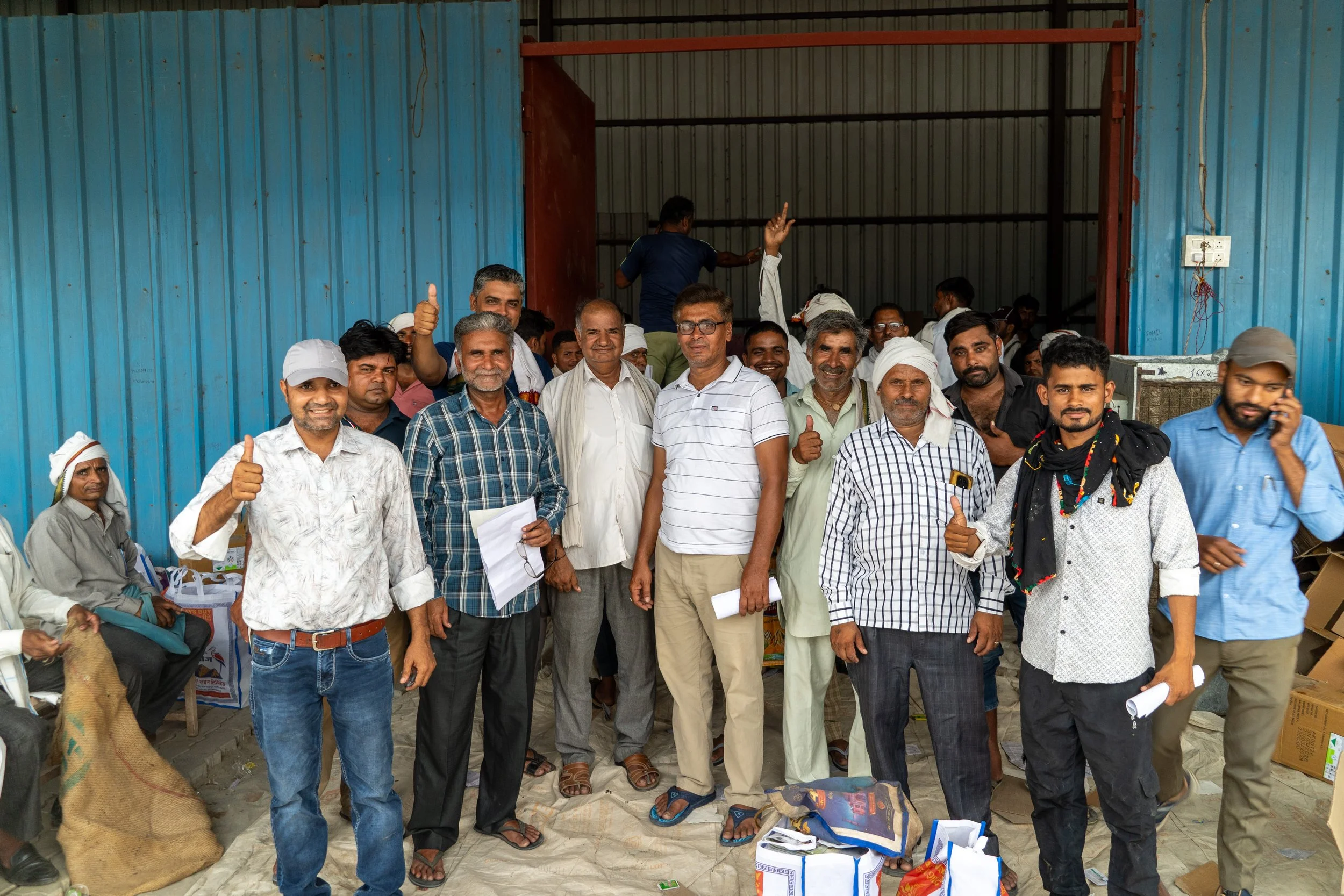 Farmers in India collecting agricultural inputs provided by Fortune Rice