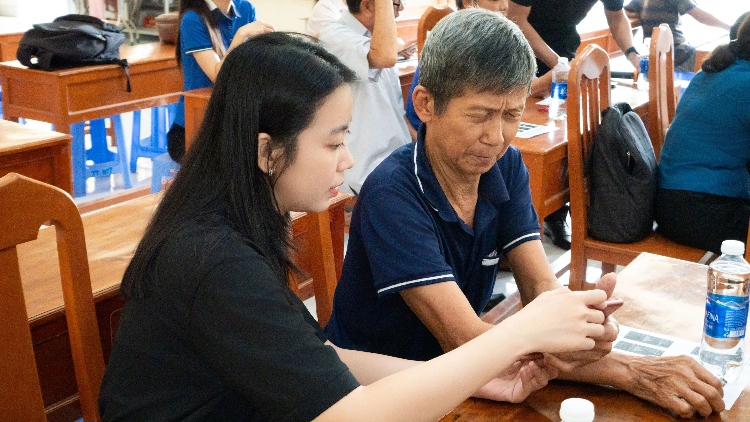 RYNAN Agriculture team teaching participants on using the RYNAN Mekong application