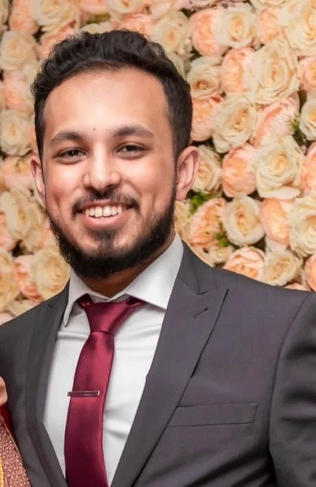 smiling happy woman inside cafe head of operations fair shot Kanice Leung