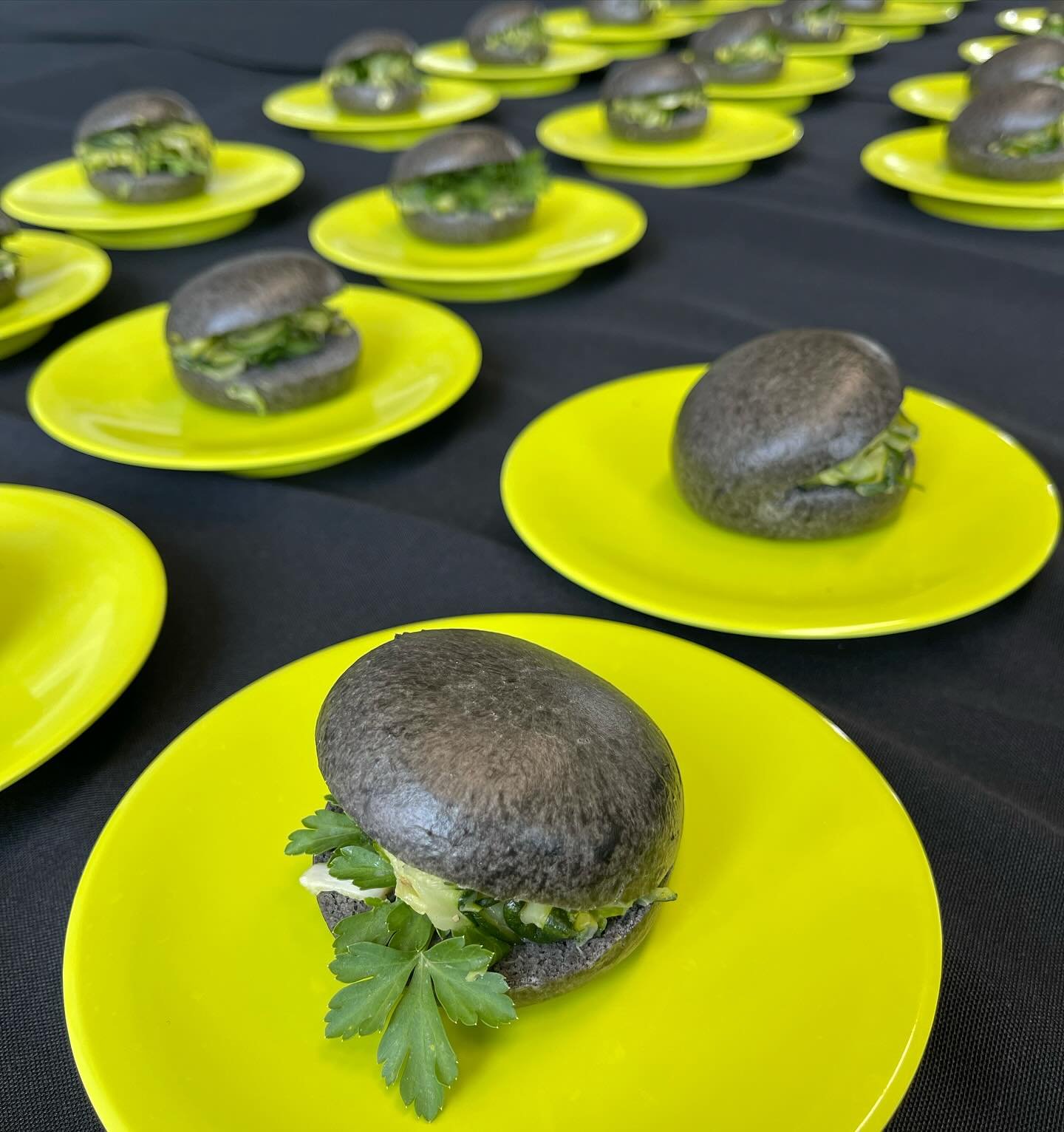 Mini black steam bun with zucchini &amp; pieterselie - simple &amp; delicious #amsinstitute #reinventingthecity #cateringamsterdam #cocodiningamsterdam #deliciousamsterdam @ams_institute