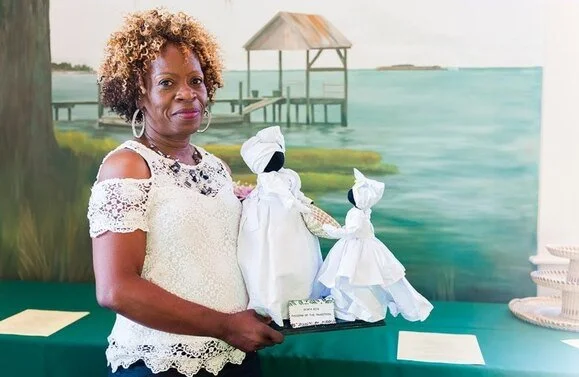Genya Watson with her Gullah Dolls of Charleston