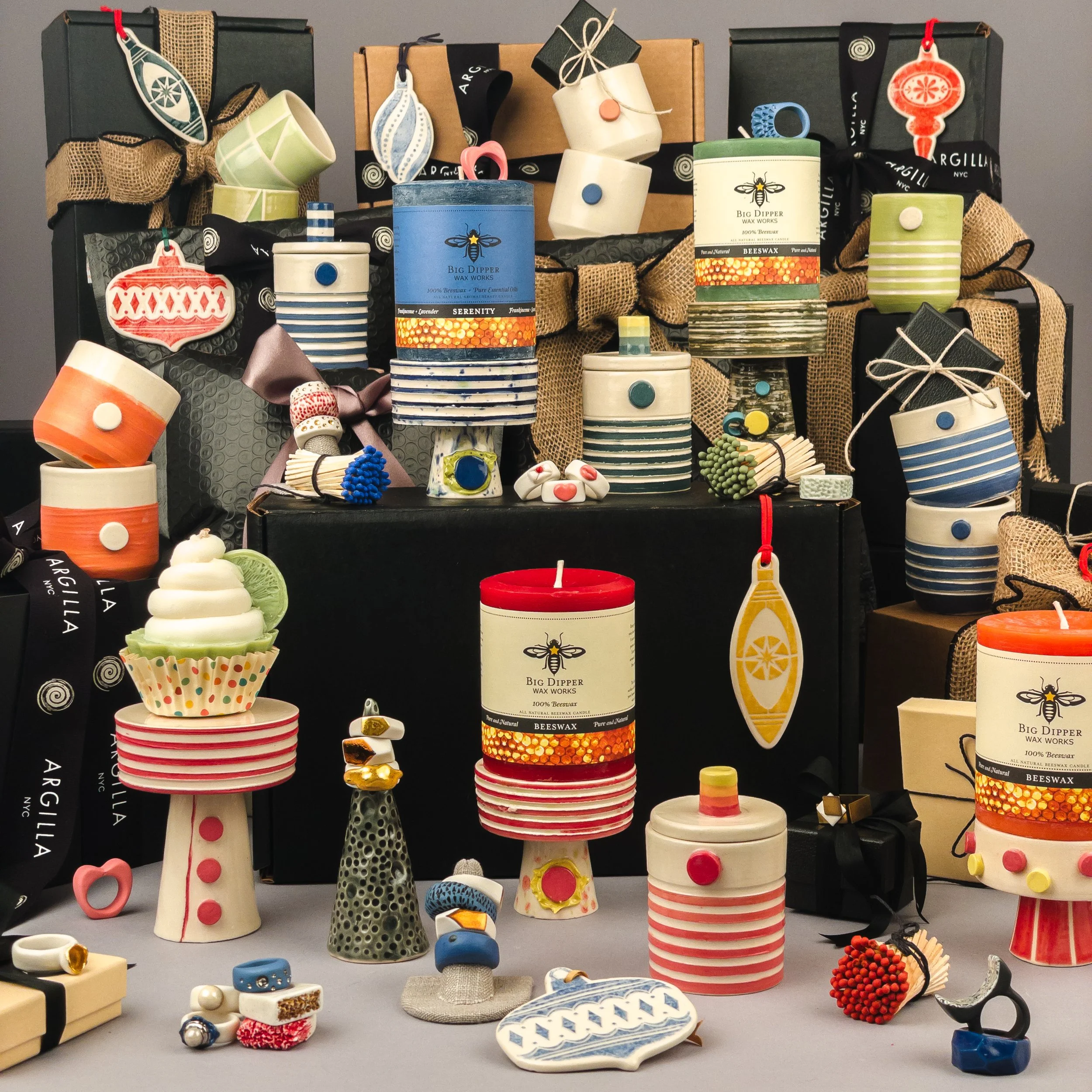 Handmade porcelain by Argilla NYC — cupcake stands, rings, match strikers and dotted cups arranged with gift boxes, Brooklyn, NYC, Italy