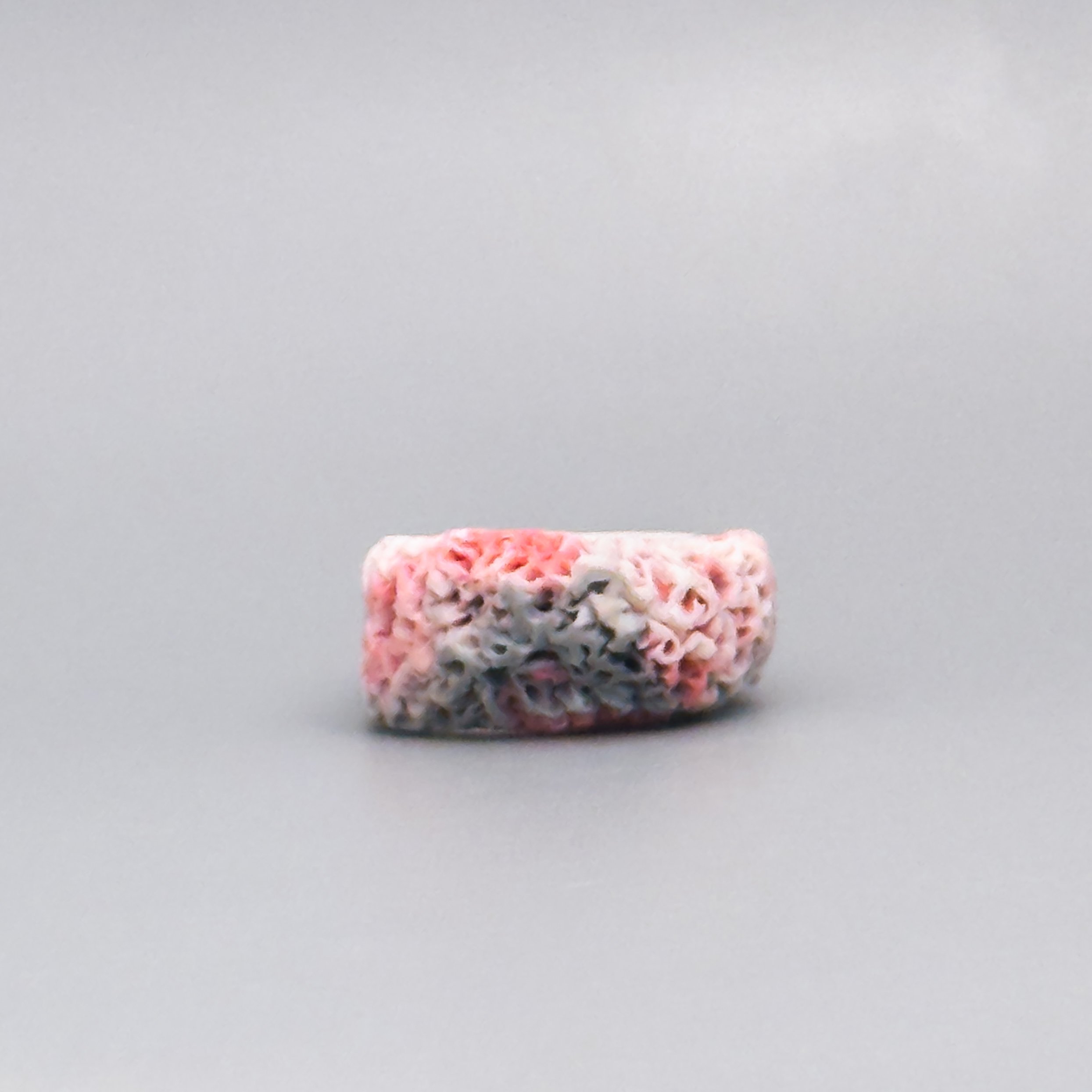 Textured porcelain ring in coral pink and gray tones – artisan ceramic ring for unique statement jewelry