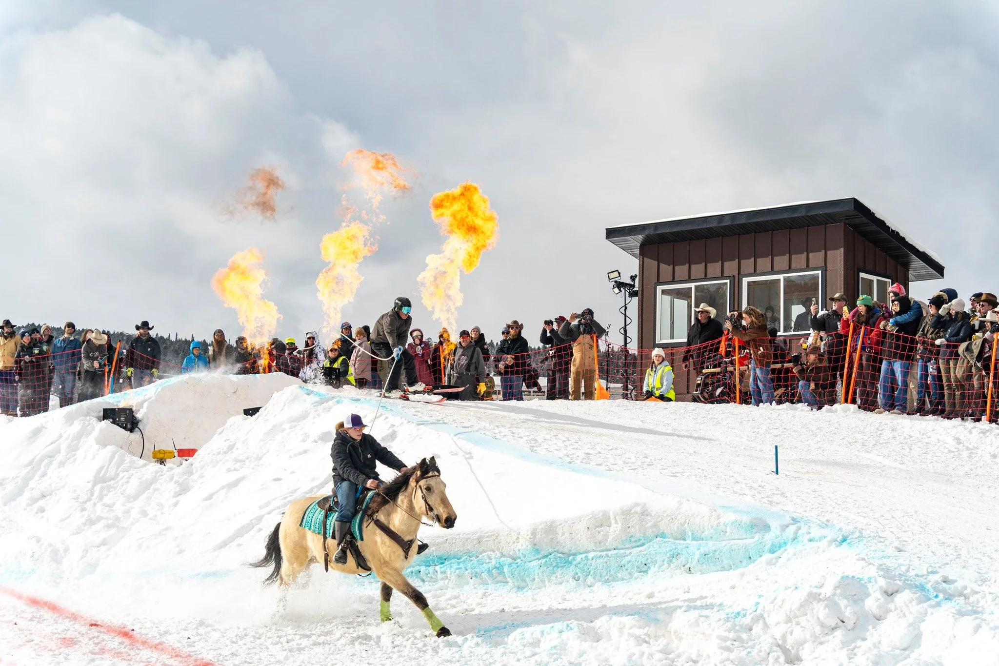 The Best in the West Showdown isn&rsquo;t just an event&mdash;it&rsquo;s a high-octane celebration of grit, horsepower, and Montana tradition. 

Each winter, skiers, riders, and horses thunder down the course, cheered on by thousands of fans who come