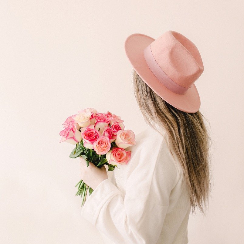 girl with peach hat.jpeg