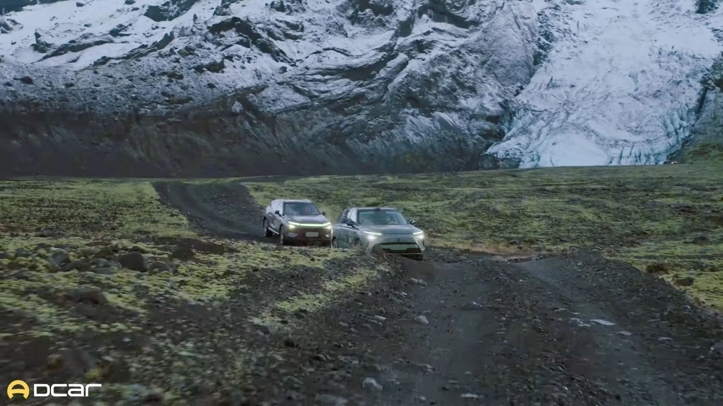 Two WEY electric vehicles driving across Icelandic volcanic terrain