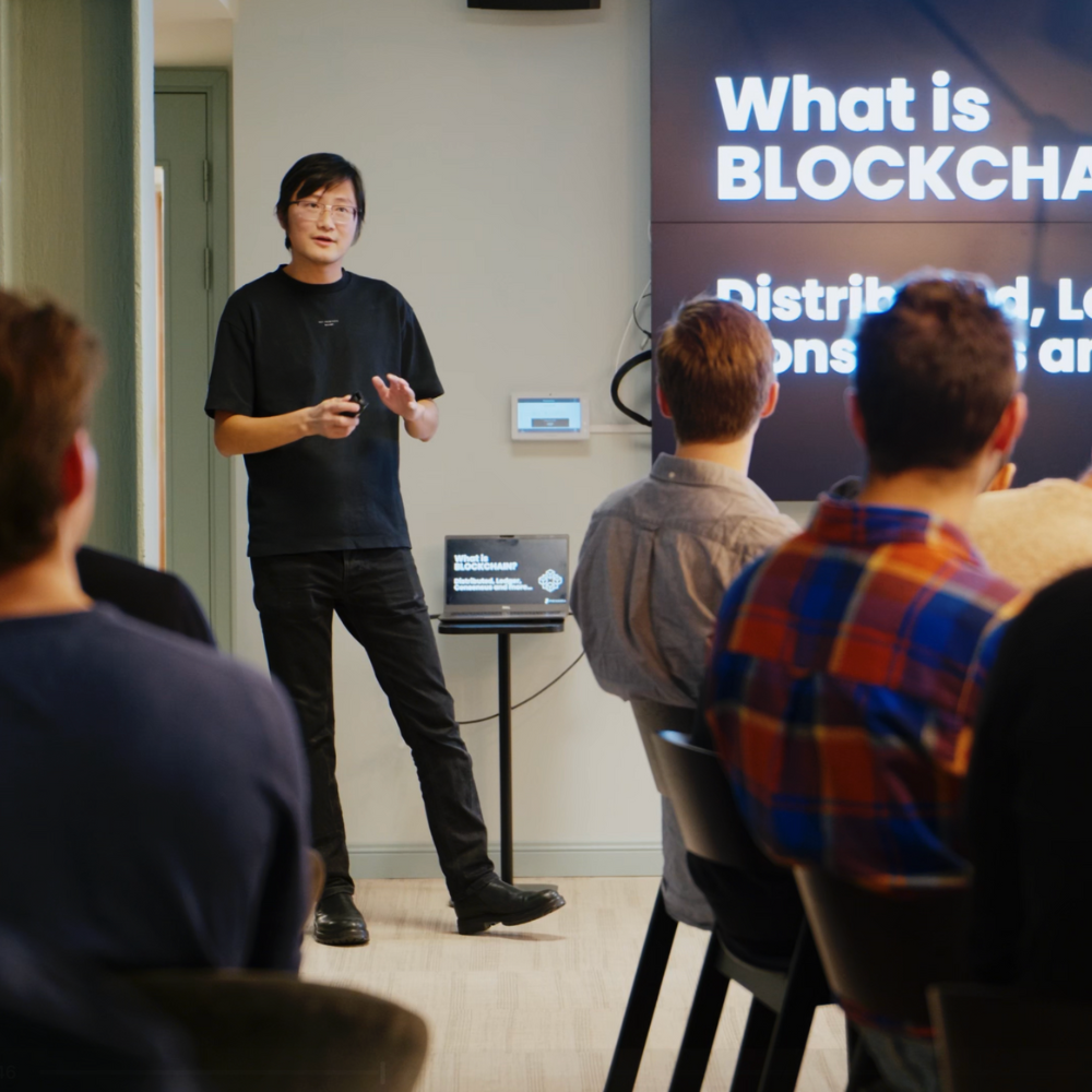 Speaker presenting at Quakka's company event in Gothenburg, Sweden