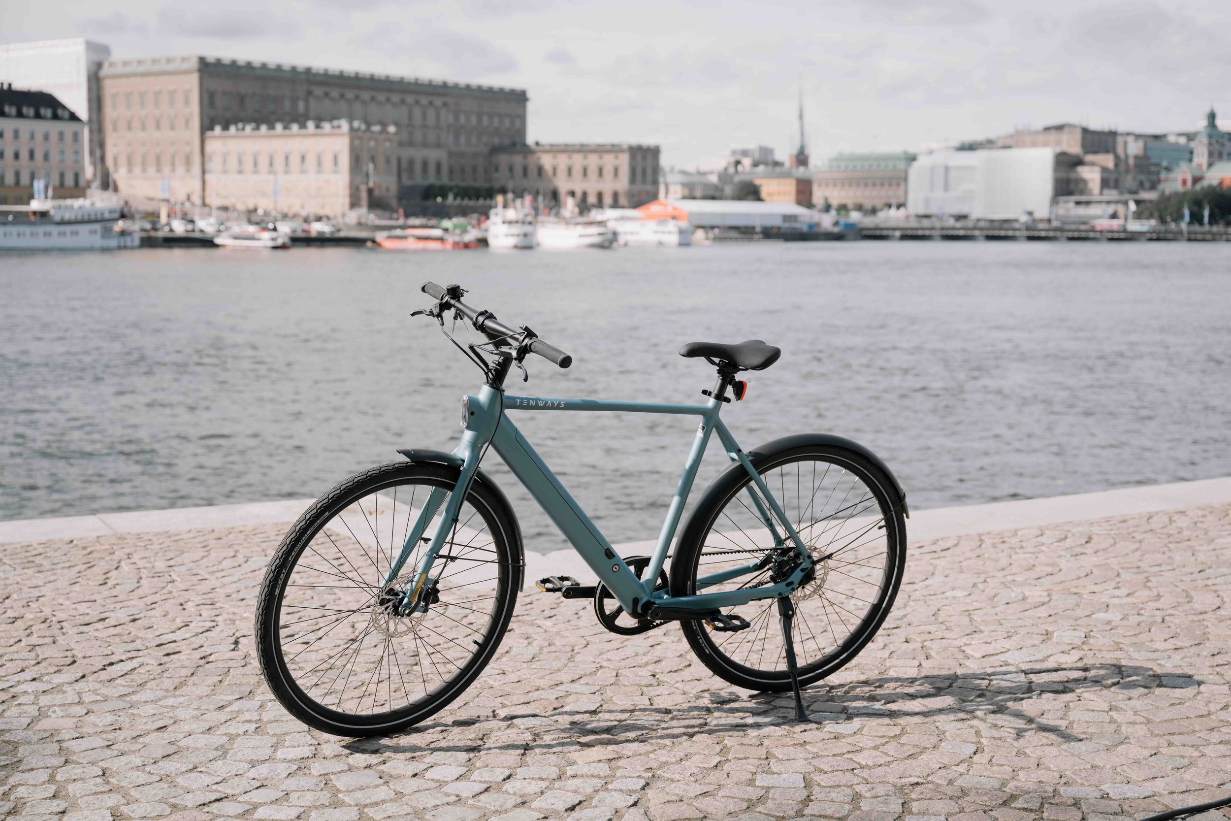 Tenways electric bike photographed against historic architecture in Stockholm