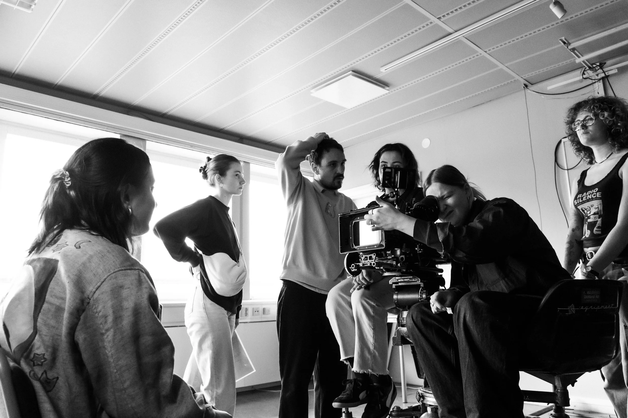 Wilma Wickström and film crew working with a cinema camera on set