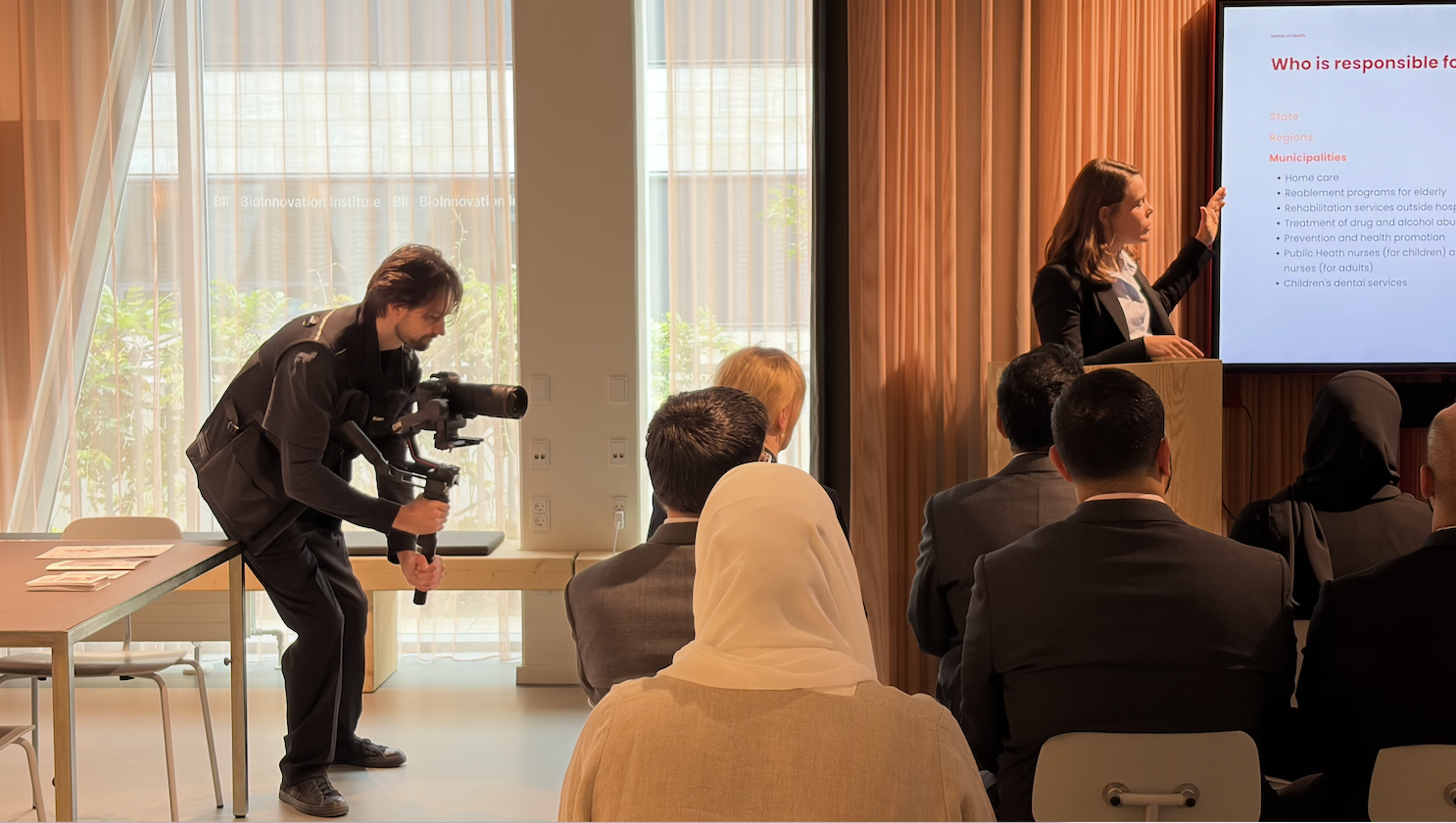 ilm8 videographer filming a healthcare delegation meeting in Sweden